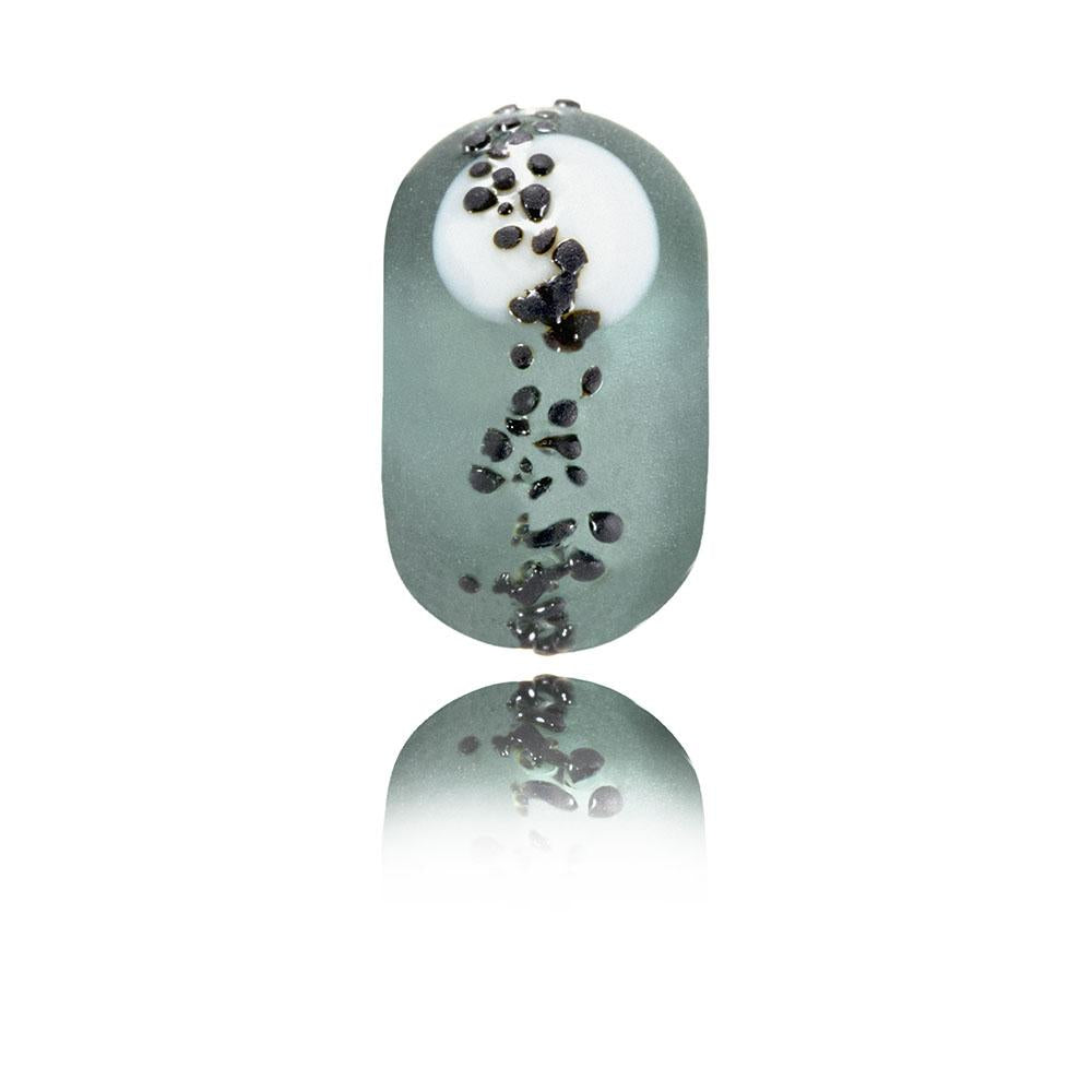 Grey frosted glass bead with white dot and black shards on surface representing Hartland Point in North Devon