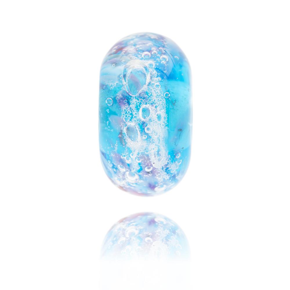 Blue, clear and purple bubbly glass bead representing Hawkers Cove in Cornwall.