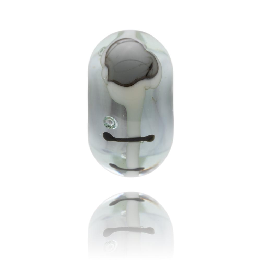 Grey glass bead with clear surface and patterns for Hayling Island in Hampshire.