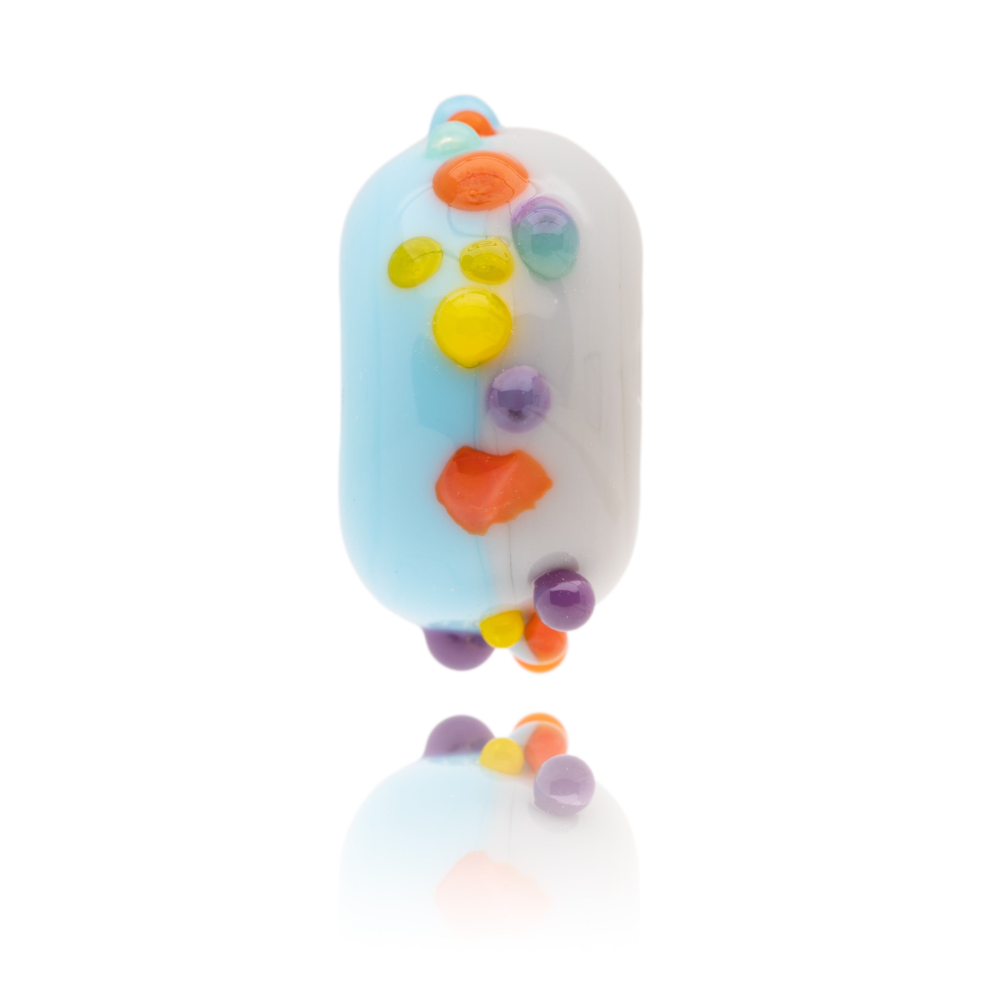 Blue and grey glass bead with orange, yellow, green and purple dots around the middle. Representing Hove Beach in Sussex.