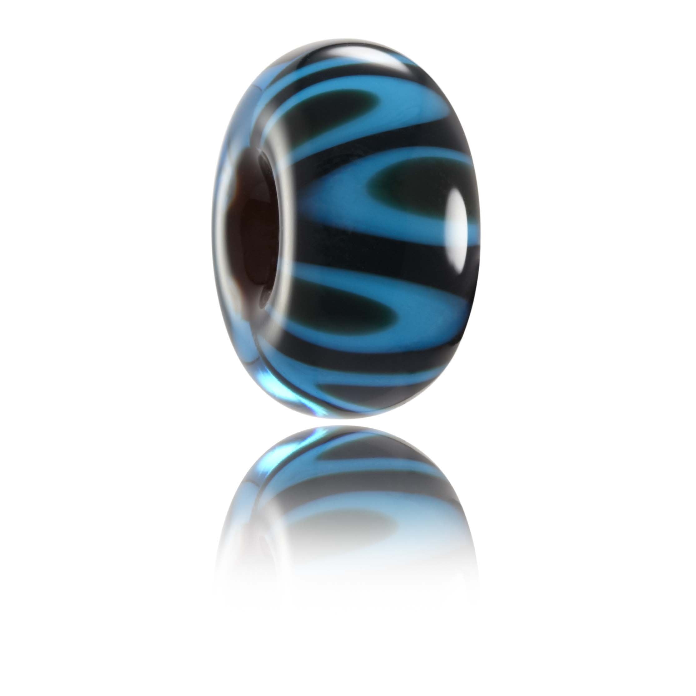 Deep dark blue glass bead with small islands beneath the surface, inspired by the island of Bali in Indonesia.