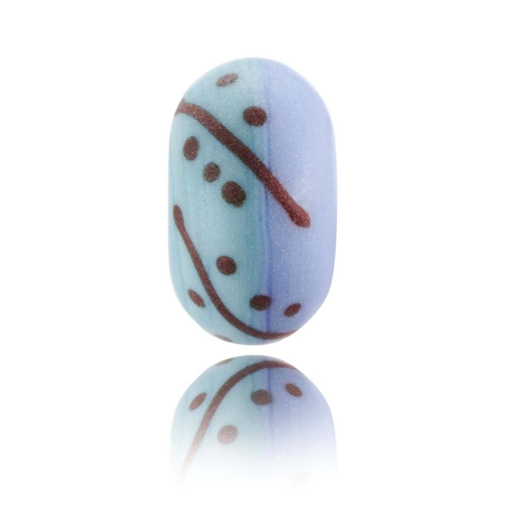 Purple and blue glass bead with red patterned on surface representing Jefferys Bay in South Africa.