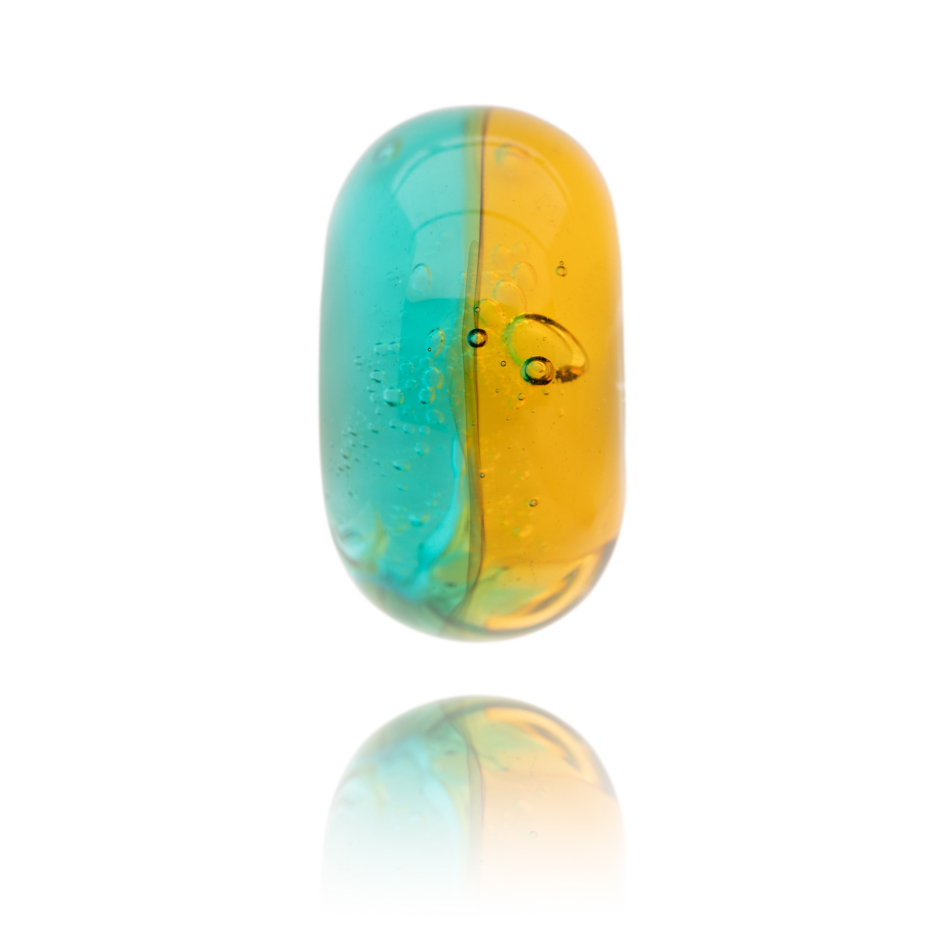 Teal and yellow Murano glass bead with bubbles in glass for Mothecombe beach South Devon.