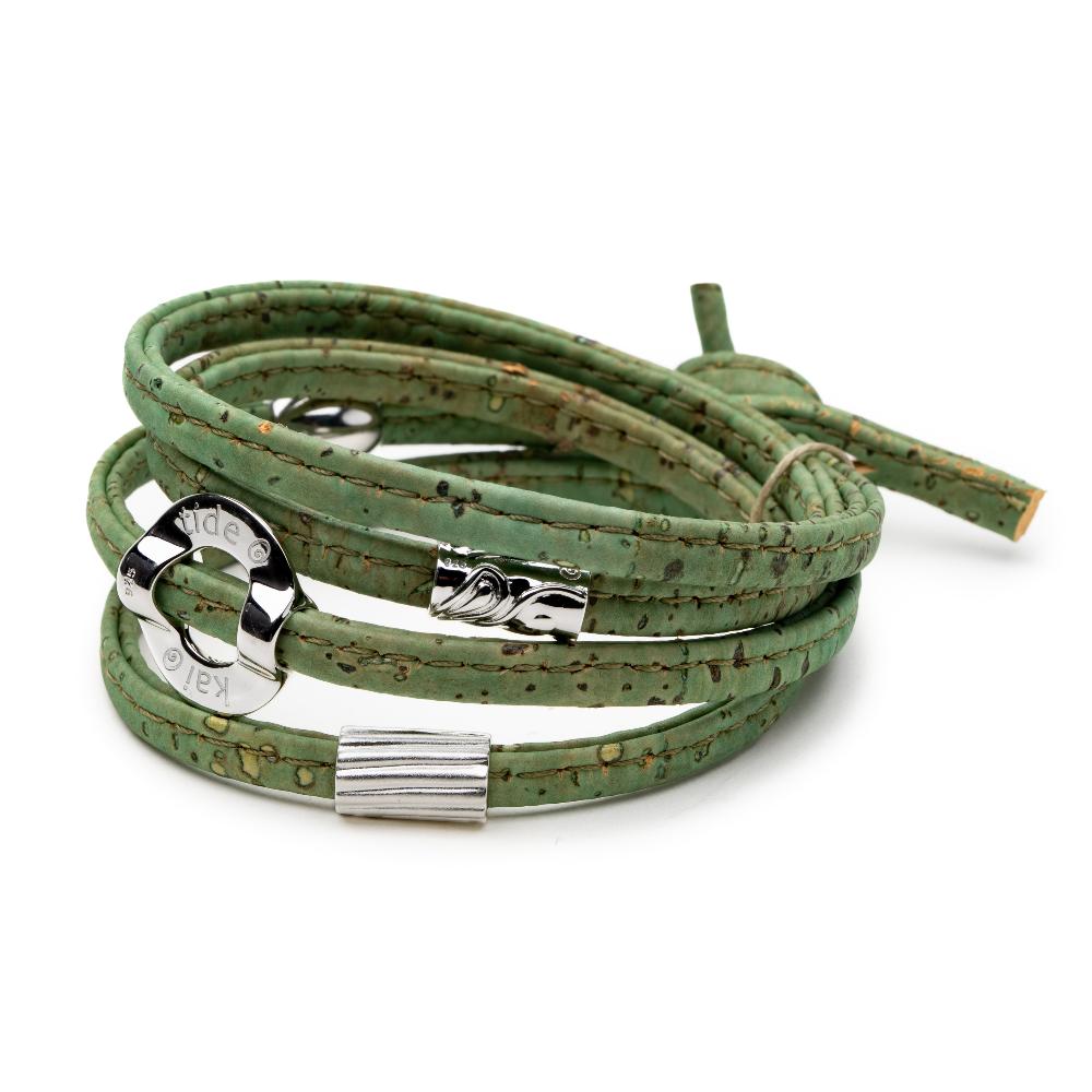 Green cork bracelet with silver charms.