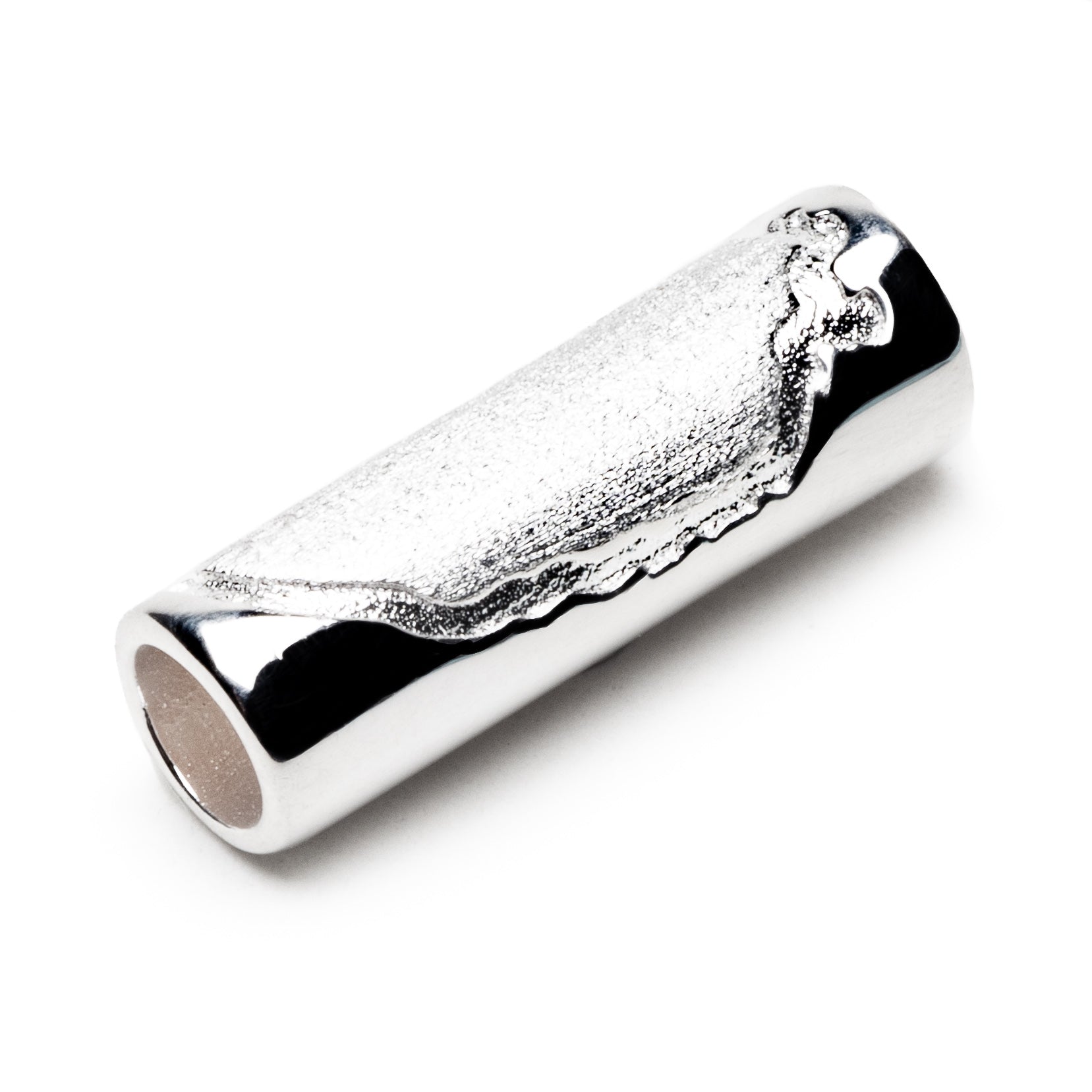 Silver tube shaped bead with Norfolk county engraved on the surface.