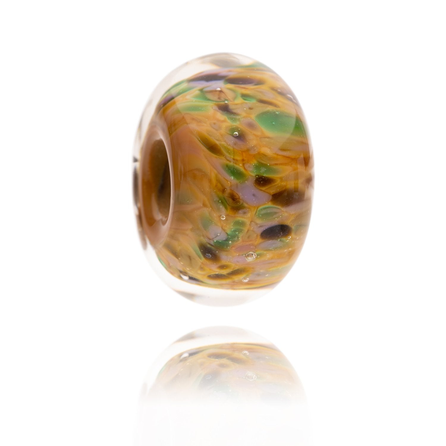 Brown, purple and green mottled glass bead representing The North Yorkshire Moor National Park in the UK.