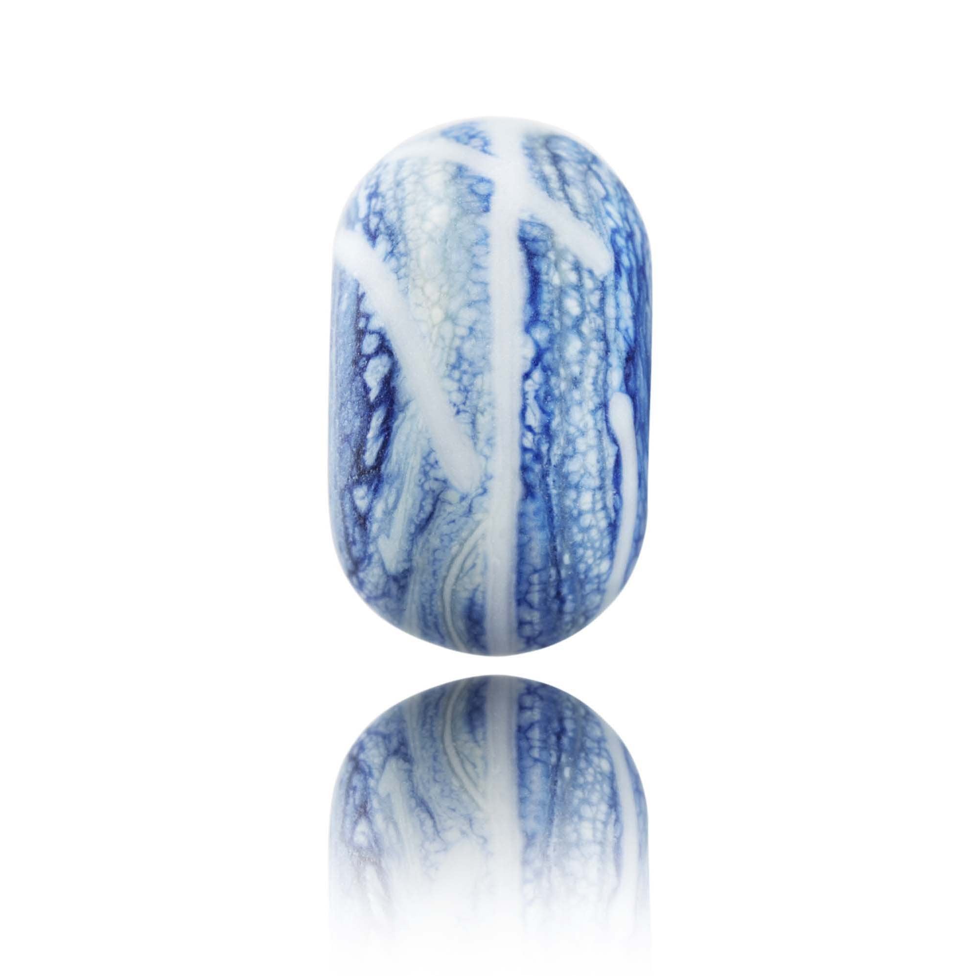 Blue and white mottled glass bead representing the fishing harbour village of Polperro in Cornwall.