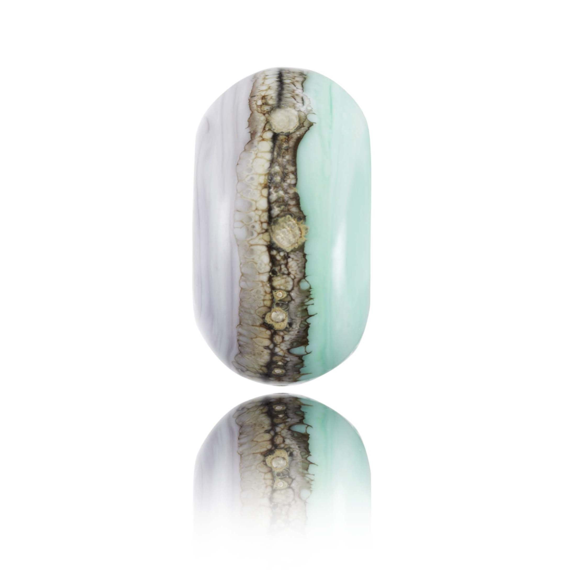 Purple and green glass bead for Porth Beach in Newquay.