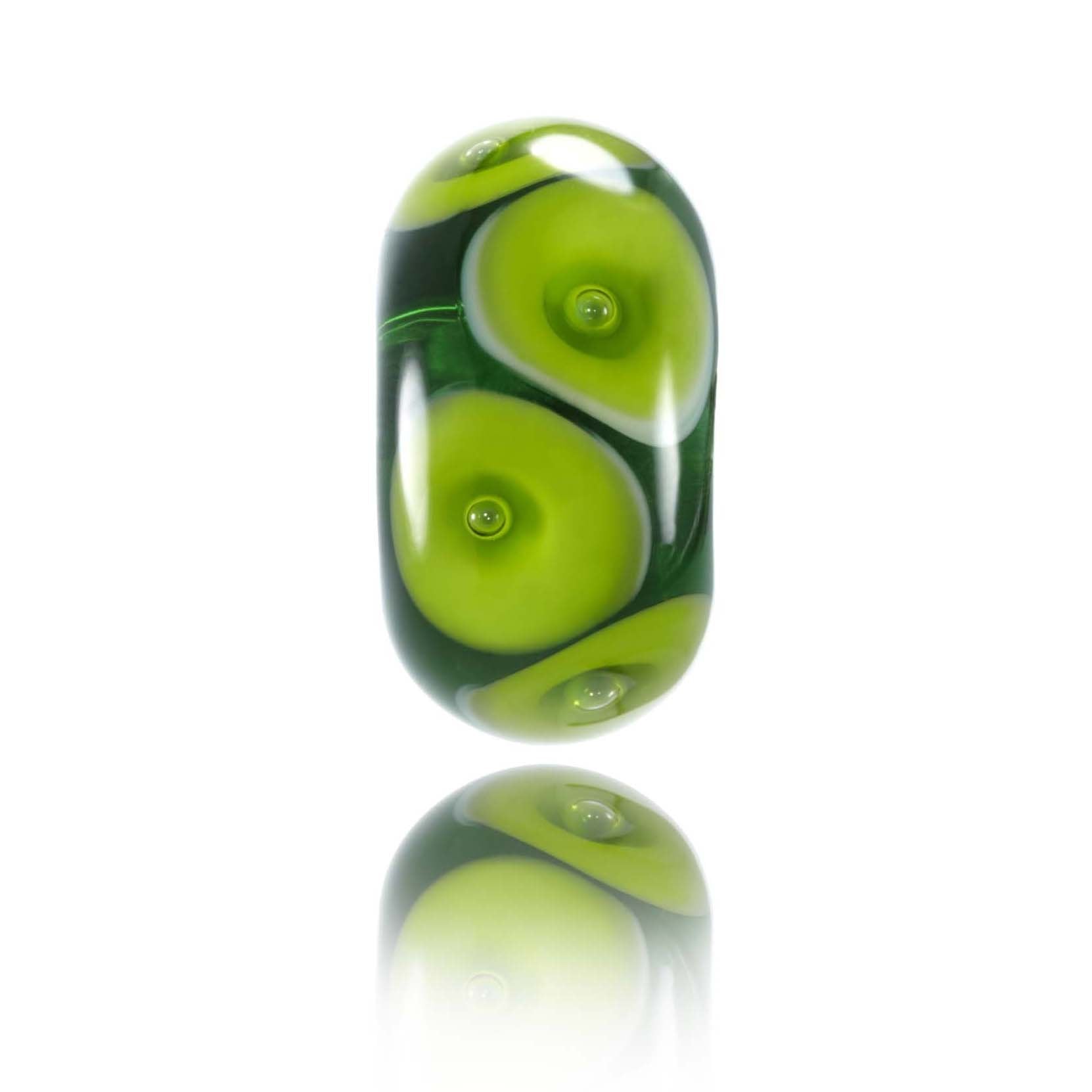 Dark green transparent glass bead with lighter green dots with bubbles on the surface, representing Piha in New Zealand.