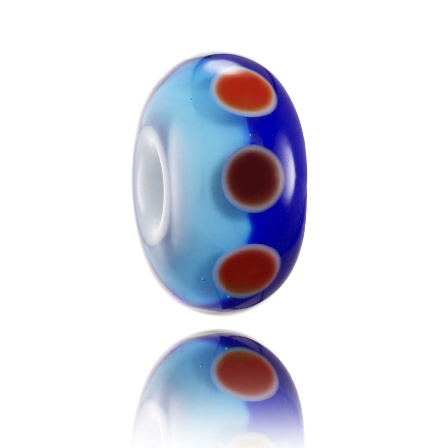 Light and dark blue glass bead with read dots around the middle. Representing Pleasure Point in California, USA.
