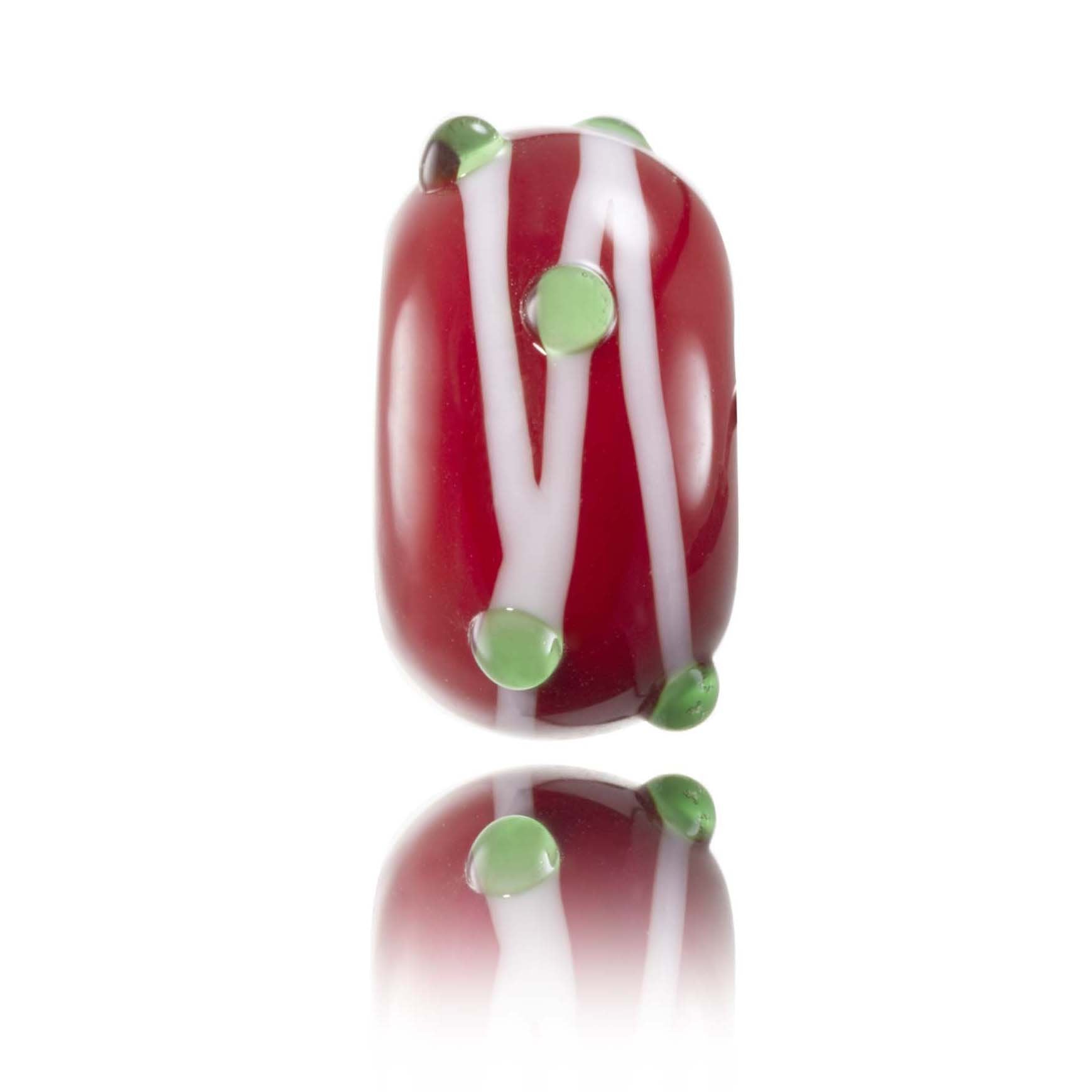 Red glass bead with white stripes going around in and green dots representing Rhosilli beach in Wales.