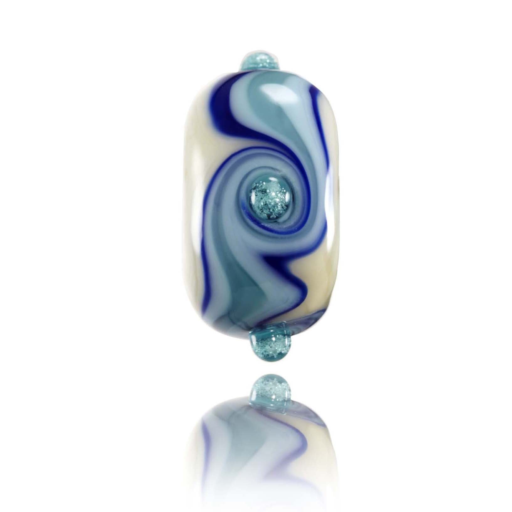 White glass bead with different shades of blue stripes around the centre with small bubble dots on the surface.