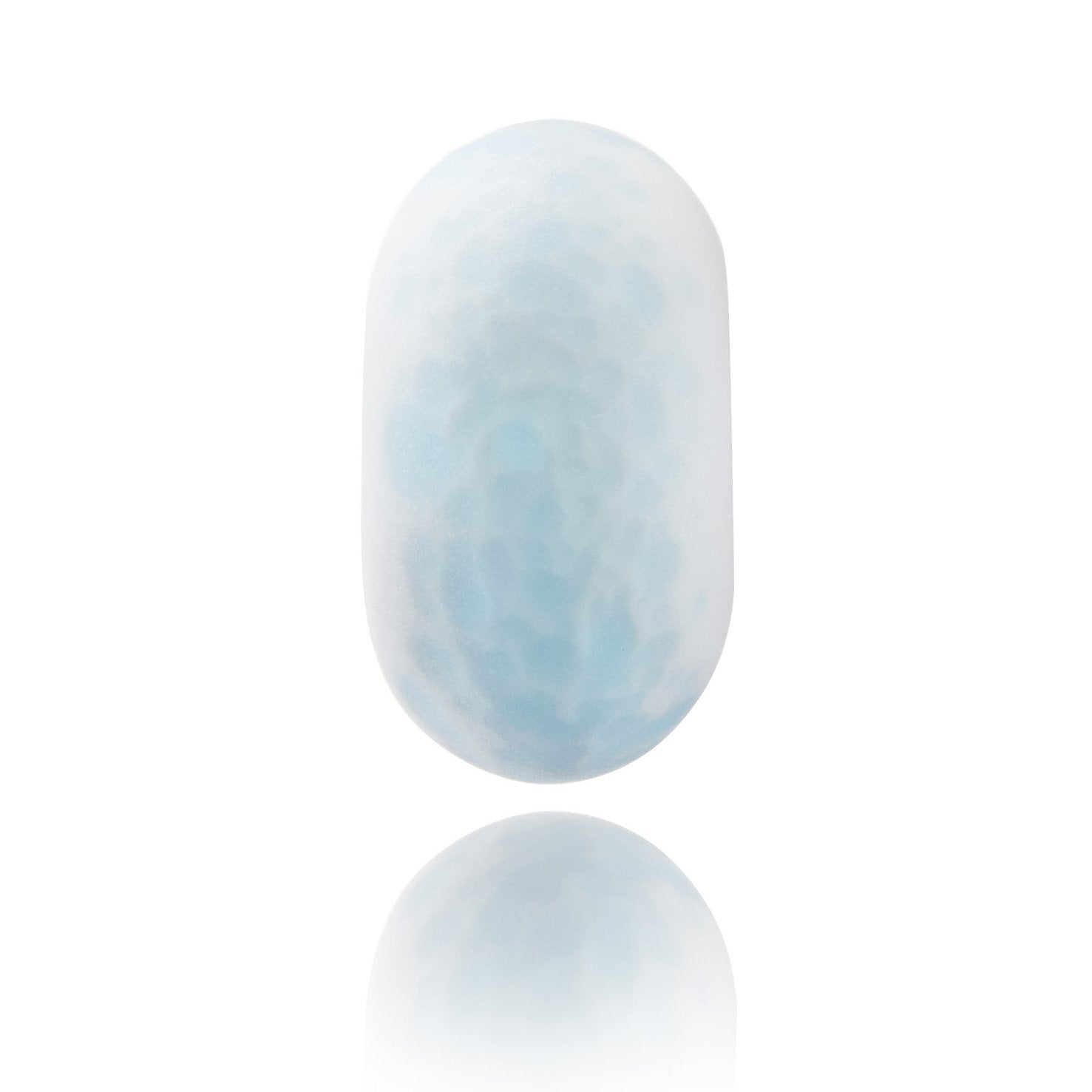 White frosted glass baed with pale blue dots on the surface, representing powder snow on the mountains.