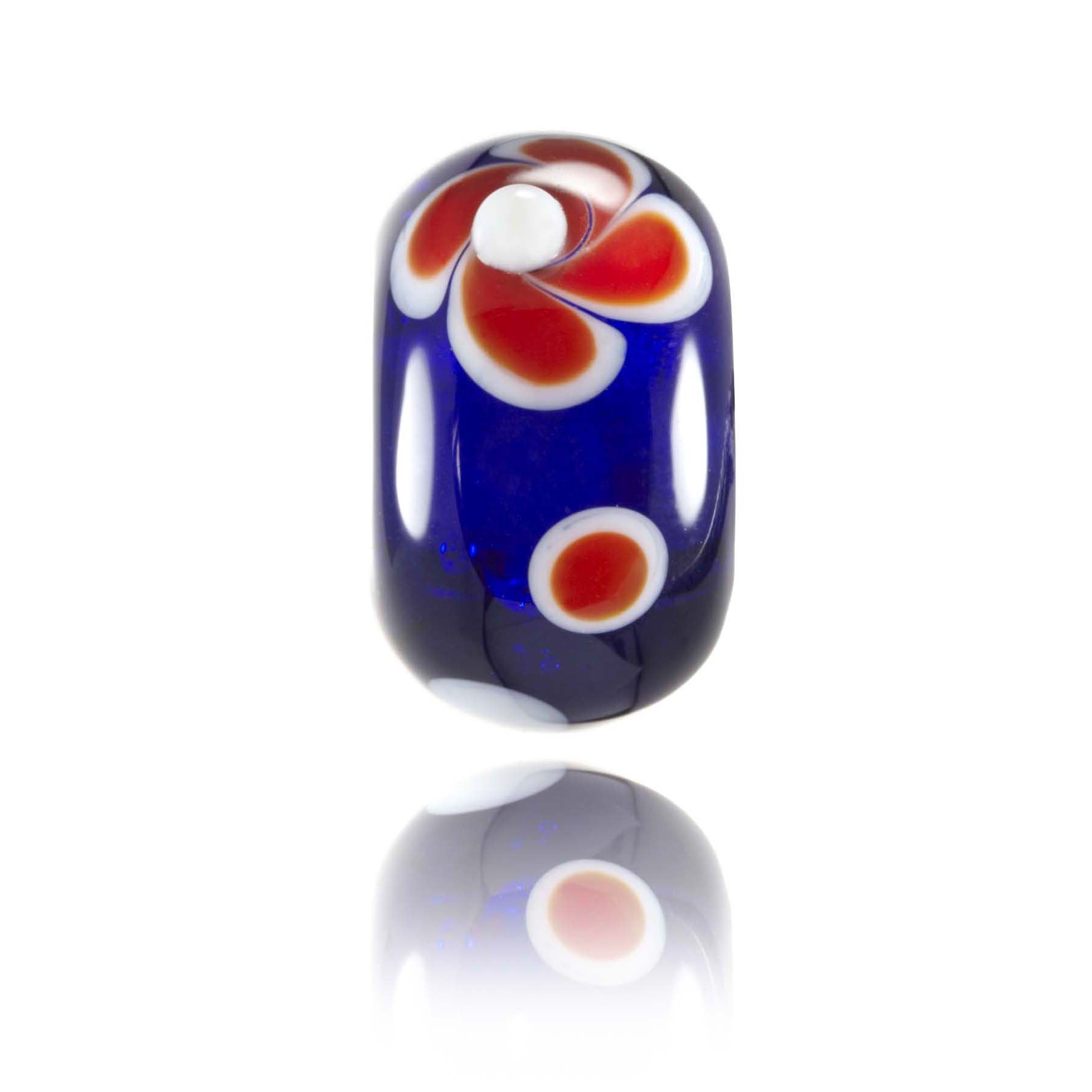 Red and blue glass bead for Stent Road beach in New Zealand.