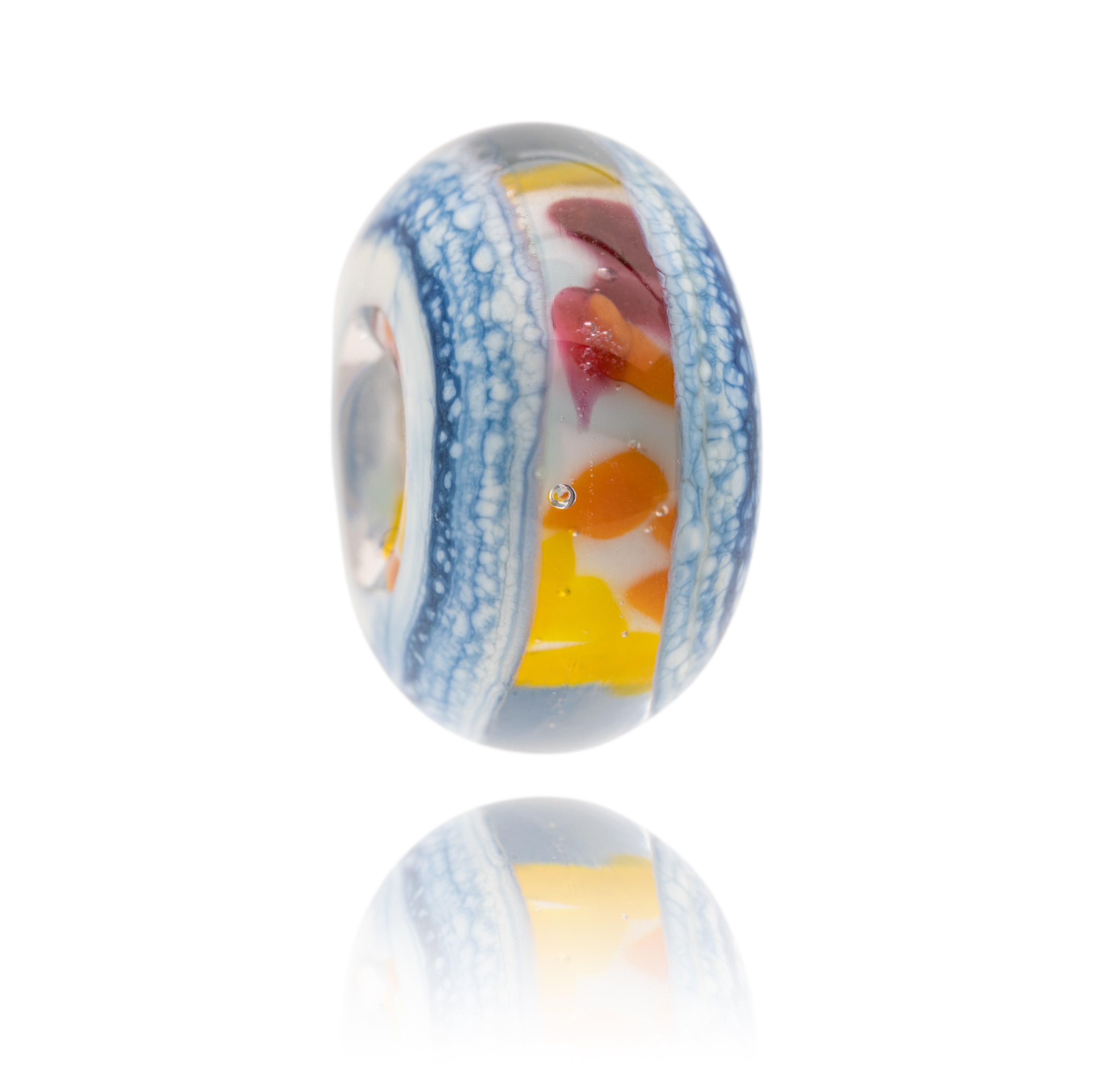 Colourful glass bead made with blue, white, red, orange and yellow Murano glass. Representing Shoreham-By-Sea in Sussex.