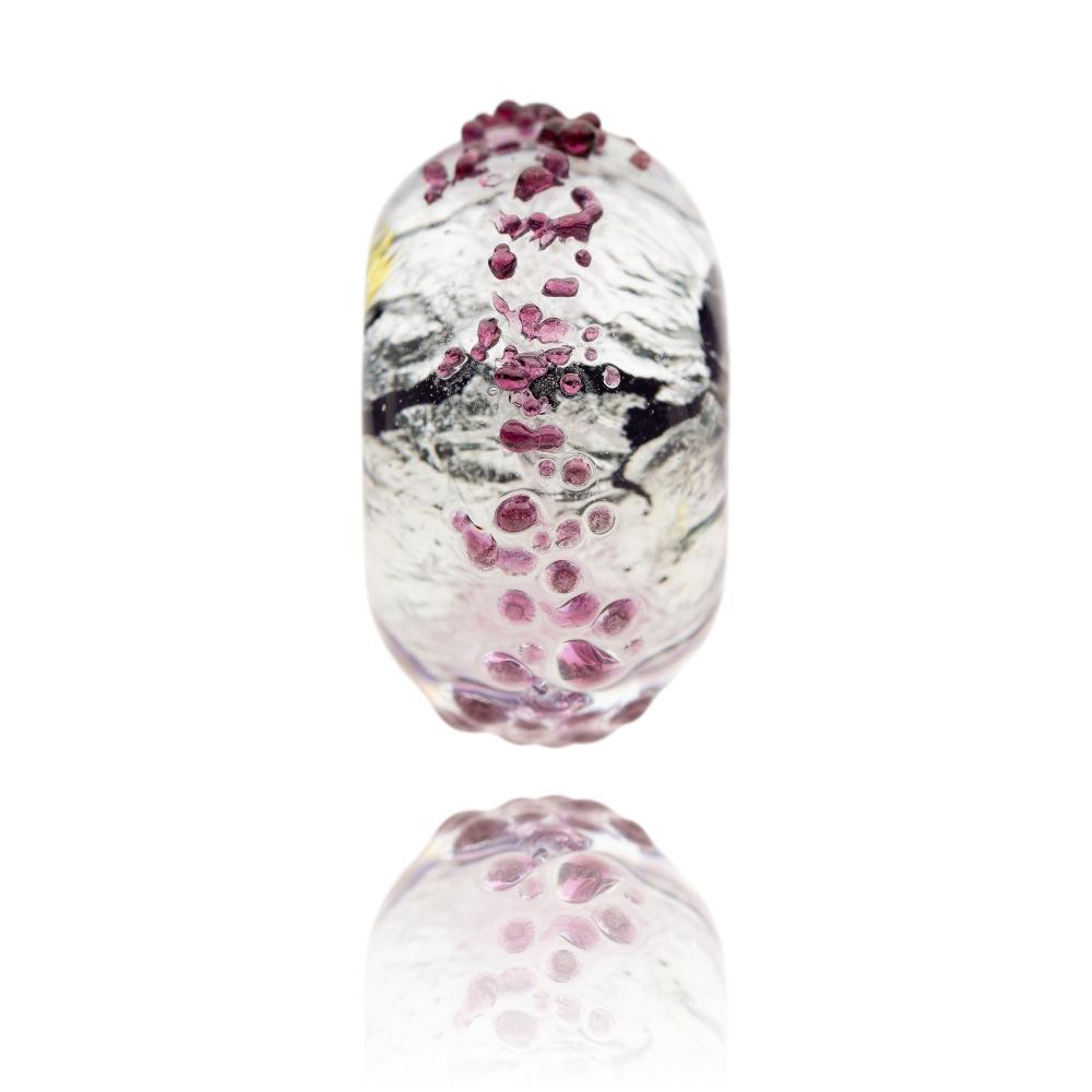 Purple and silver glass bead for the Isle Of South Uist in Scotland.