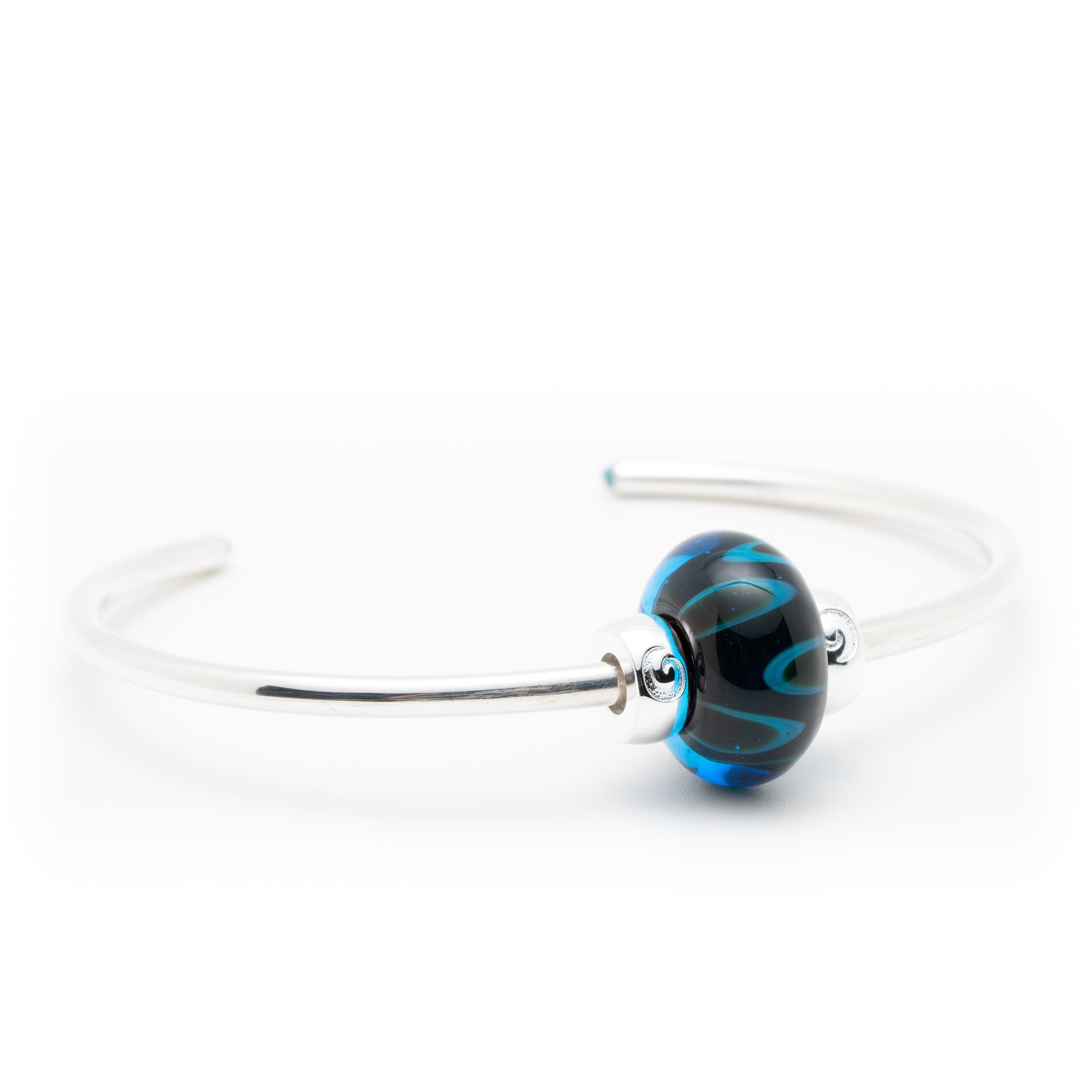 Glass bead representing Bali on sterling silver bangle.