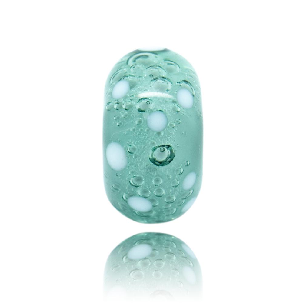 Grey and white spotted bubbly glass bead representing Hemsedal in Norway.