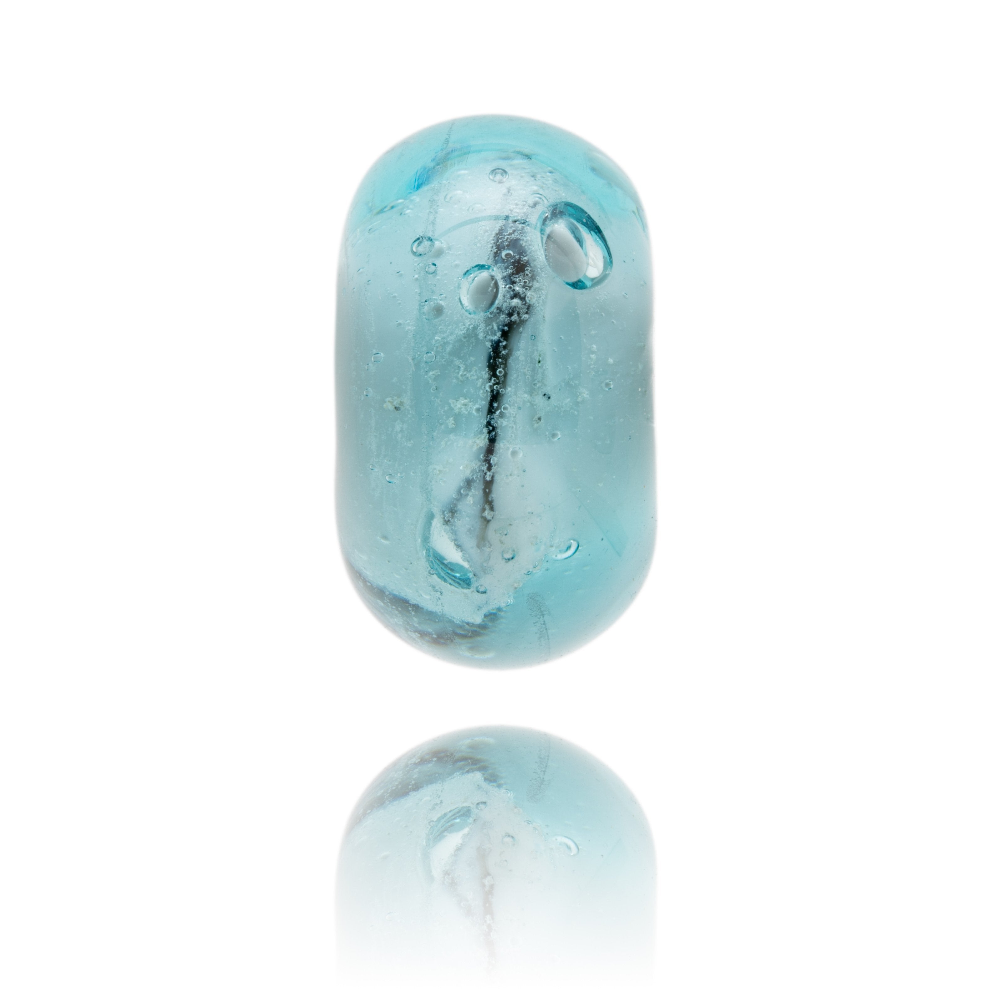 Blue, clear and black glass baed with swirls and bubbles.