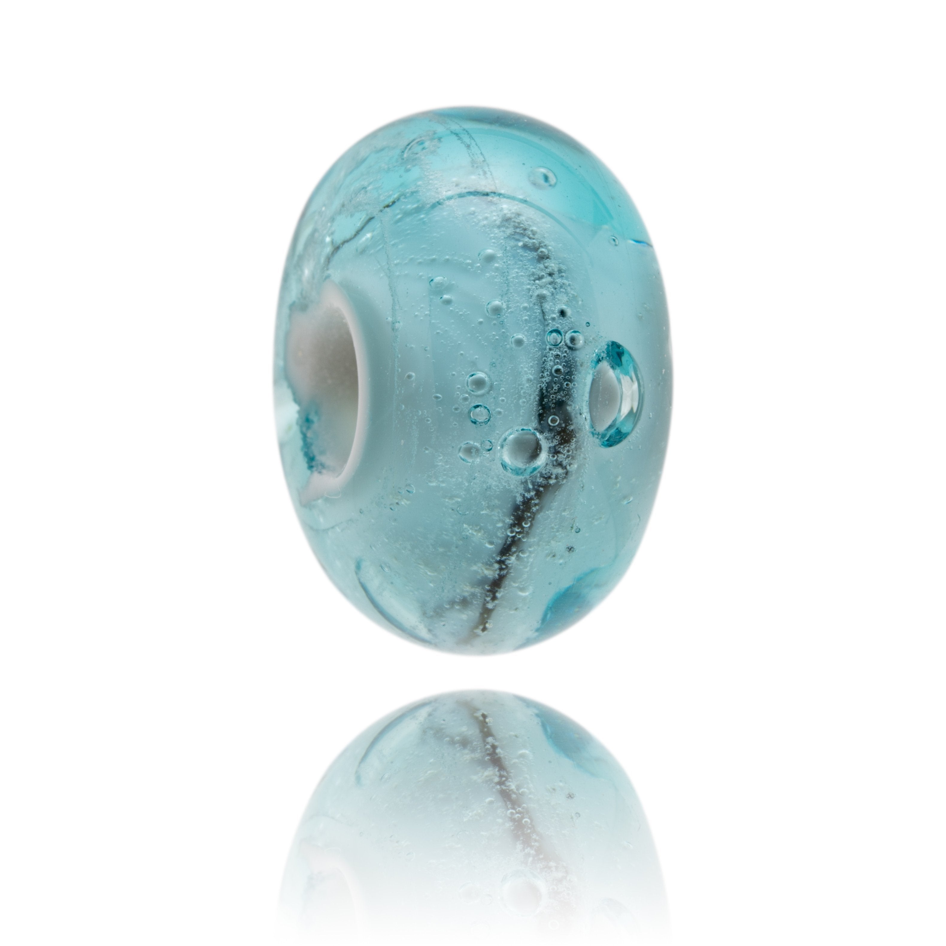 Blue, clear and black glass baed with swirls and bubbles.