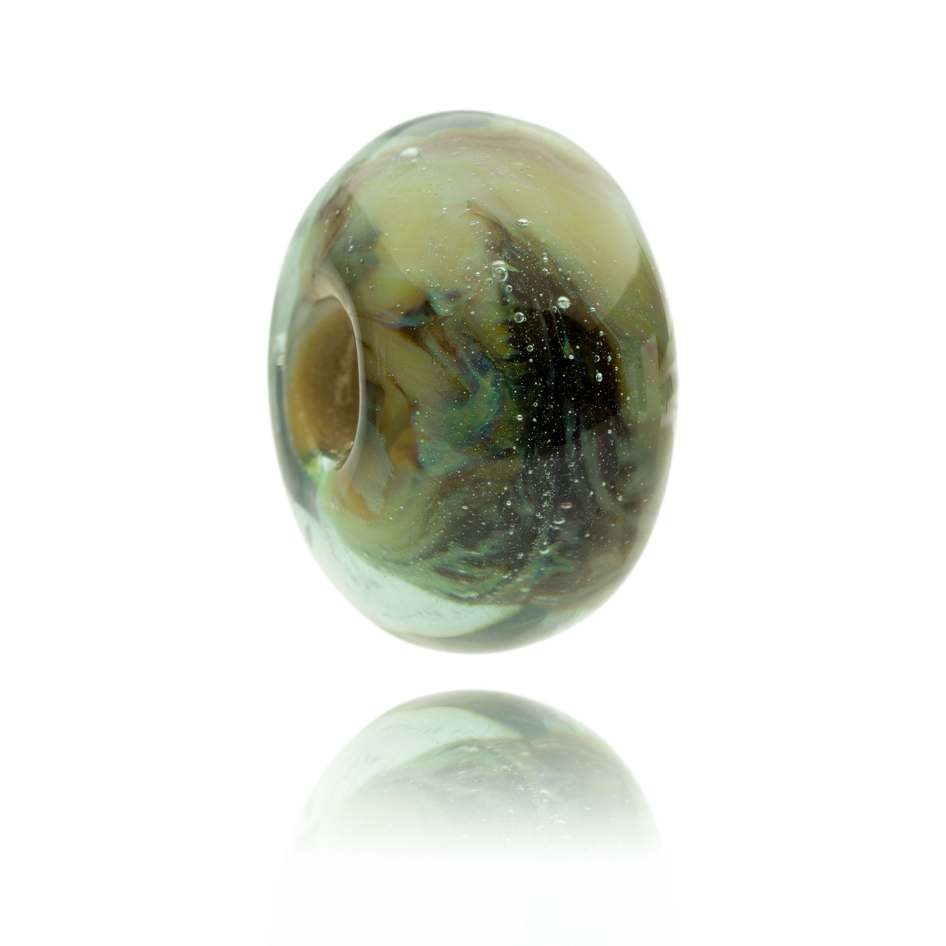 Green grey swirling shiny glass bead representing Brecon Beacons National Park in Wales.