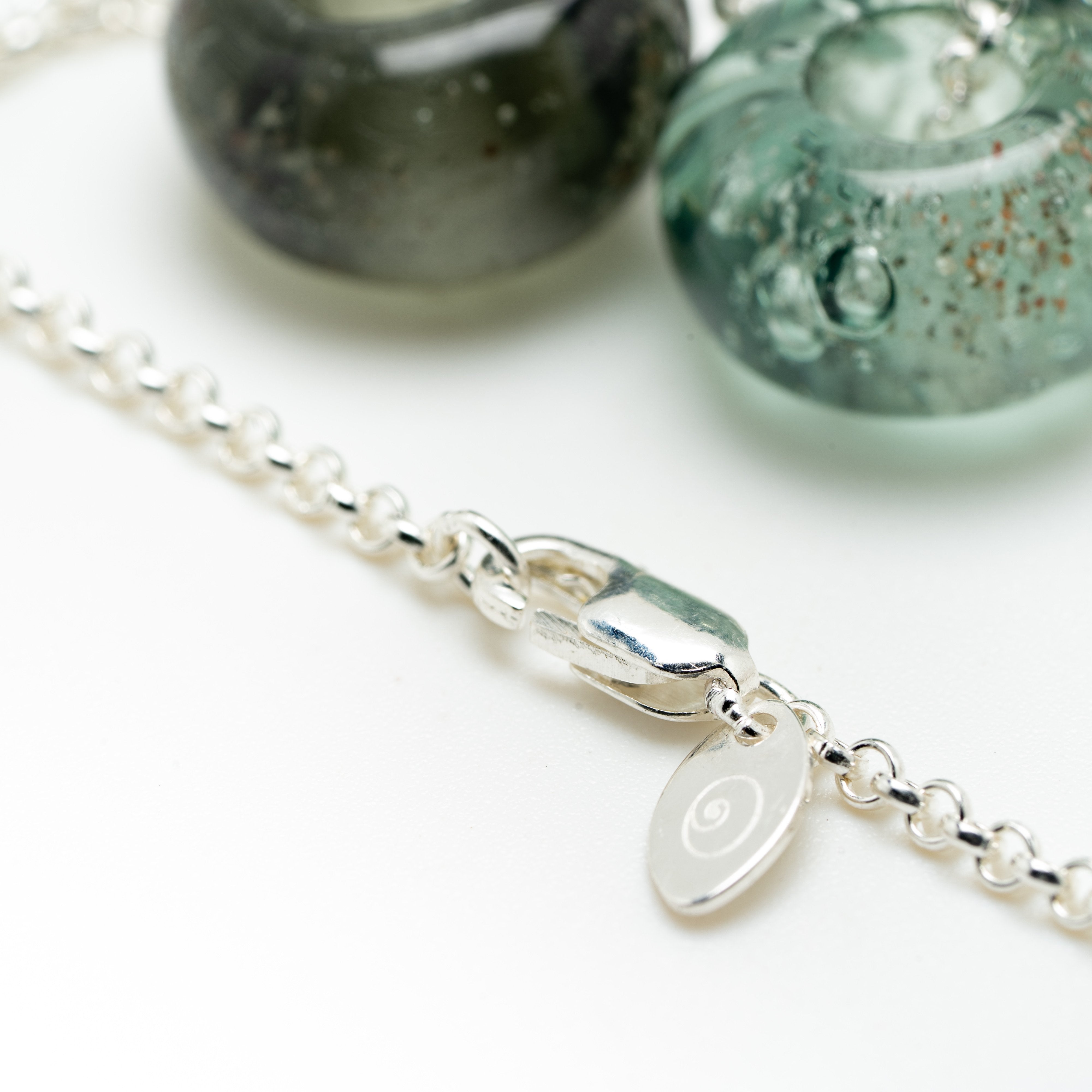 Beads and clasp detail of necklace.