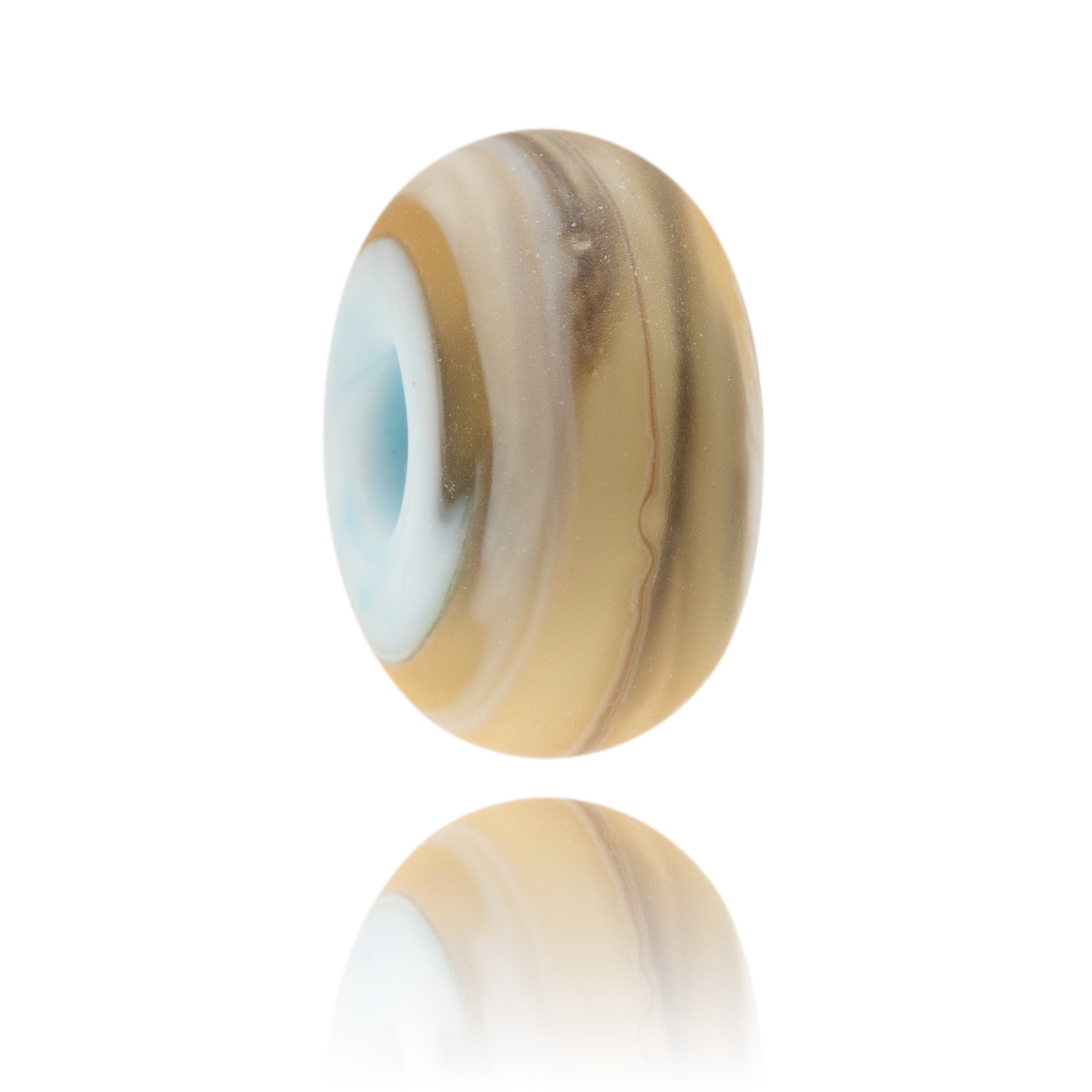 Swirling brown, white and blue glass bead with frosted finish for Chisel Beach in Dorset.