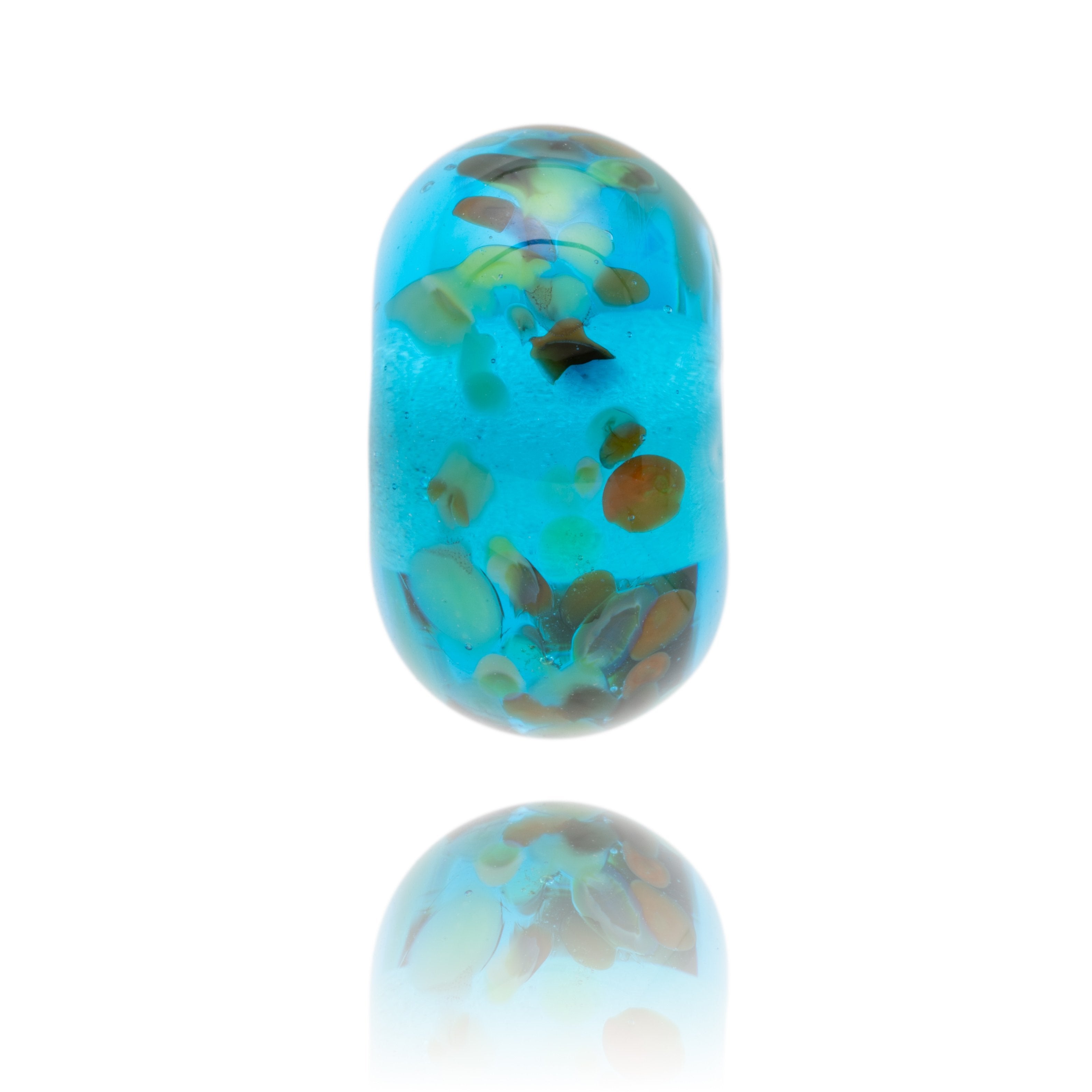 Turquoise glass bead with colour pieces floating within the glass representing Hope Cove in South Devon. Front shot.