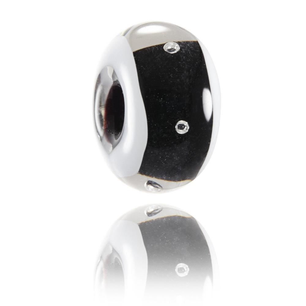 Glass bead with a black core and clear glass encasing it with white stripes down each side and little bubbles within the bead, representing Mammoth Mountain in theUSA.