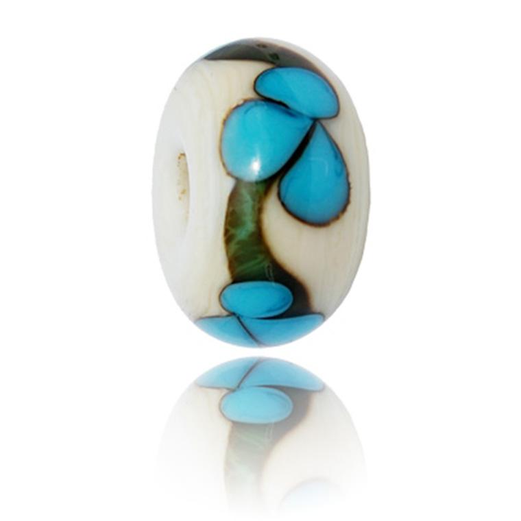 Cream glass bead with green stripe around the middle and turquoise flower pattern, representing Portstewart beach in Ireland.