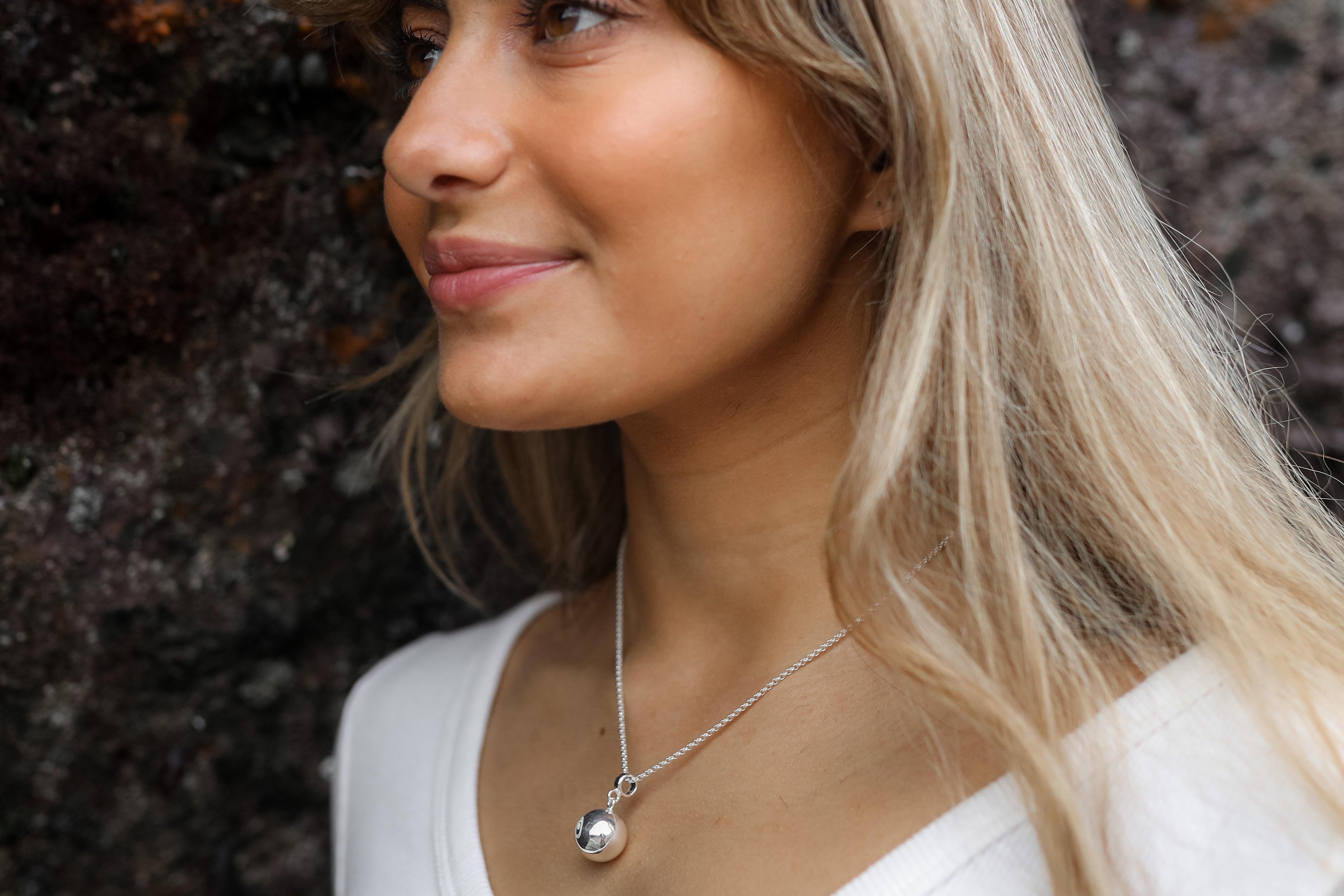 Nalu Silver Chime Ball Necklace Lifestyle Image