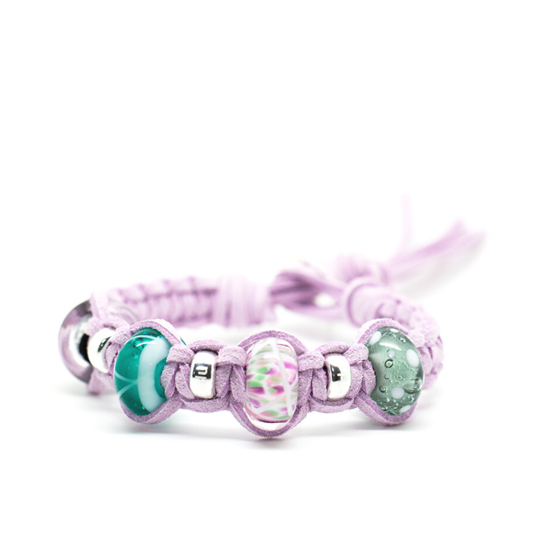 Custom Nalu bracelet in thistle cord with glass and silver beads.