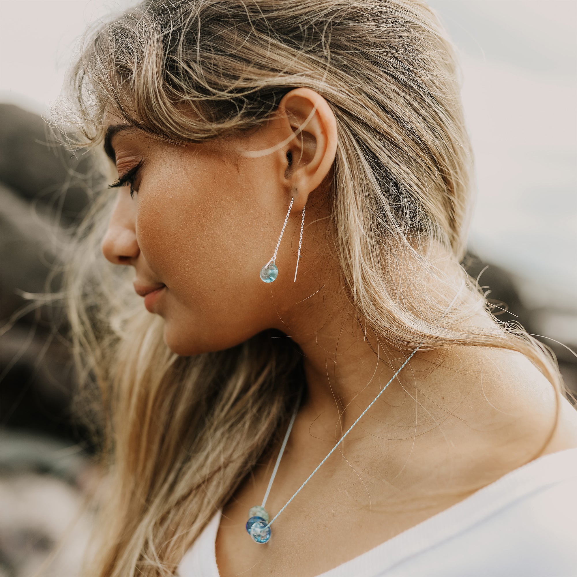 Mint sea glass beads strung on silver thread earrings with matching necklace.