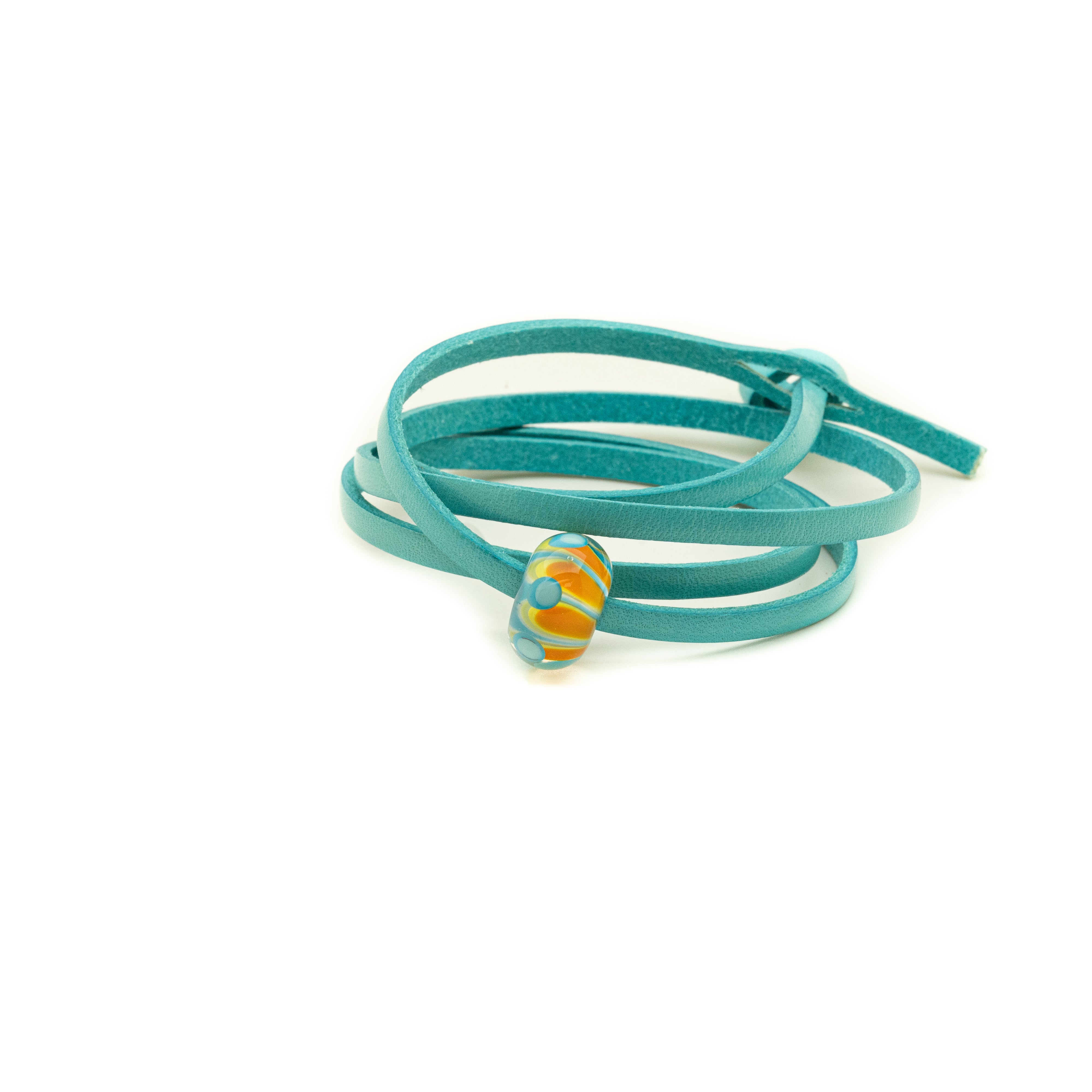 Blue and yellow glass petal bead on a turquoise leather bracelet.