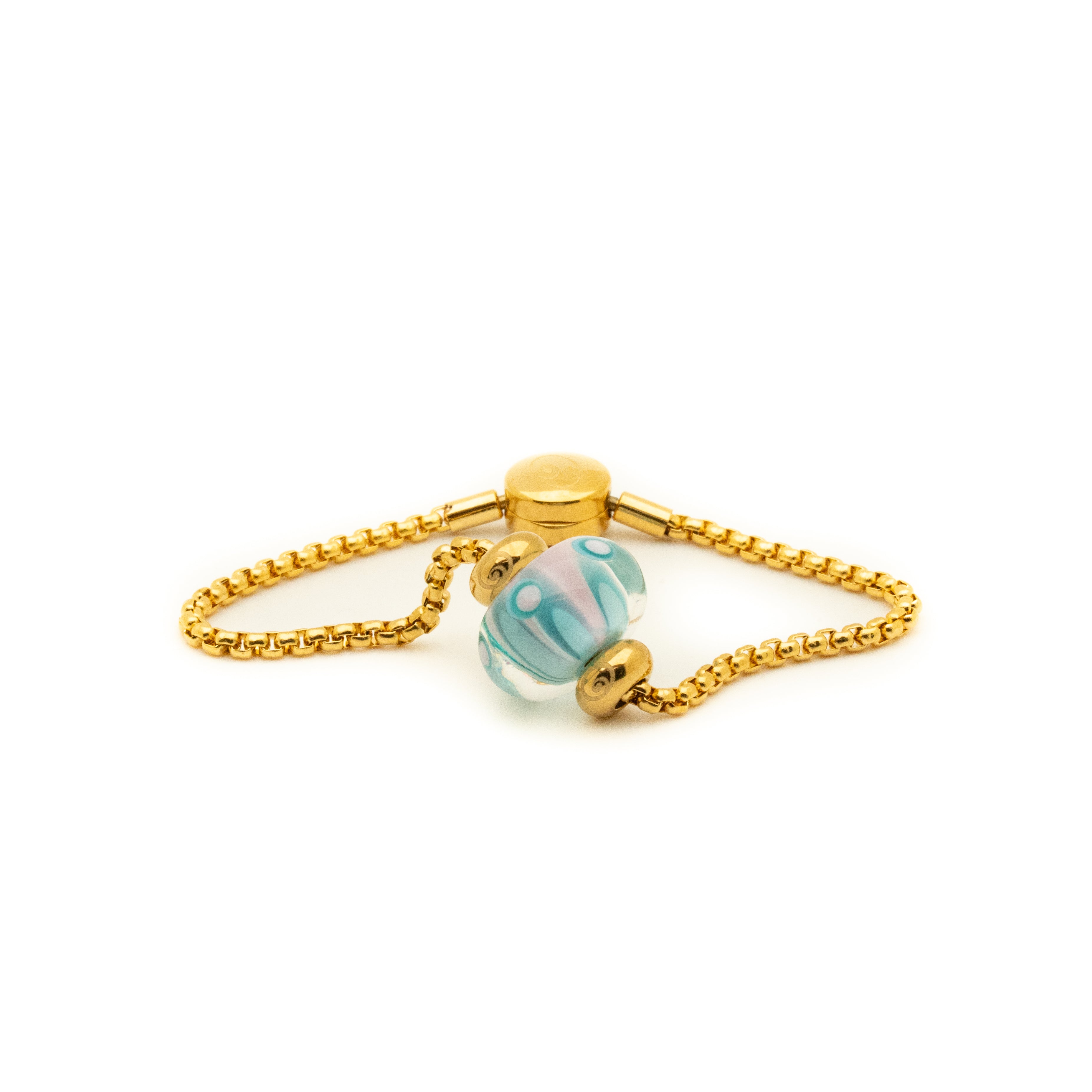 Pink and green pattern bead on gold chain bracelet.