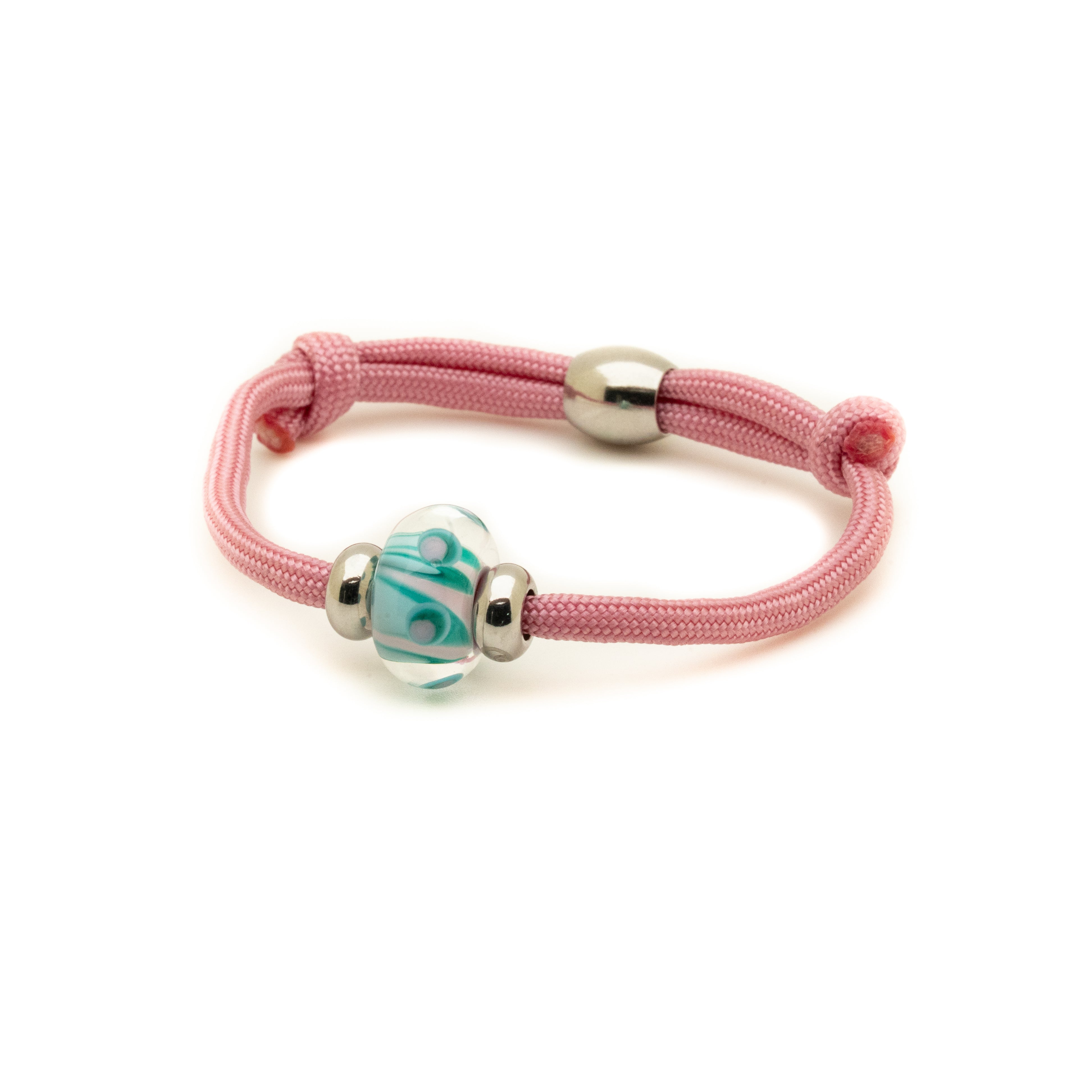 Glass bead on pink cord bracelet.