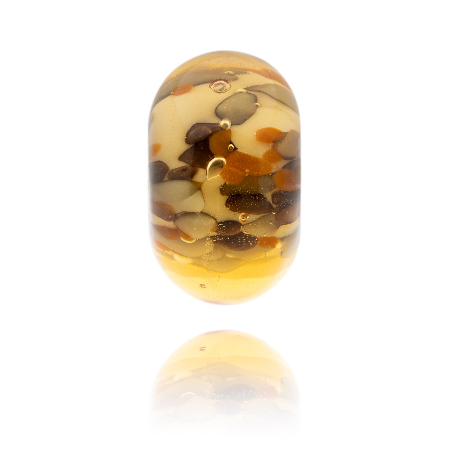 Amber, orange and brown glass bead representing Allonby beach in Cumbria.