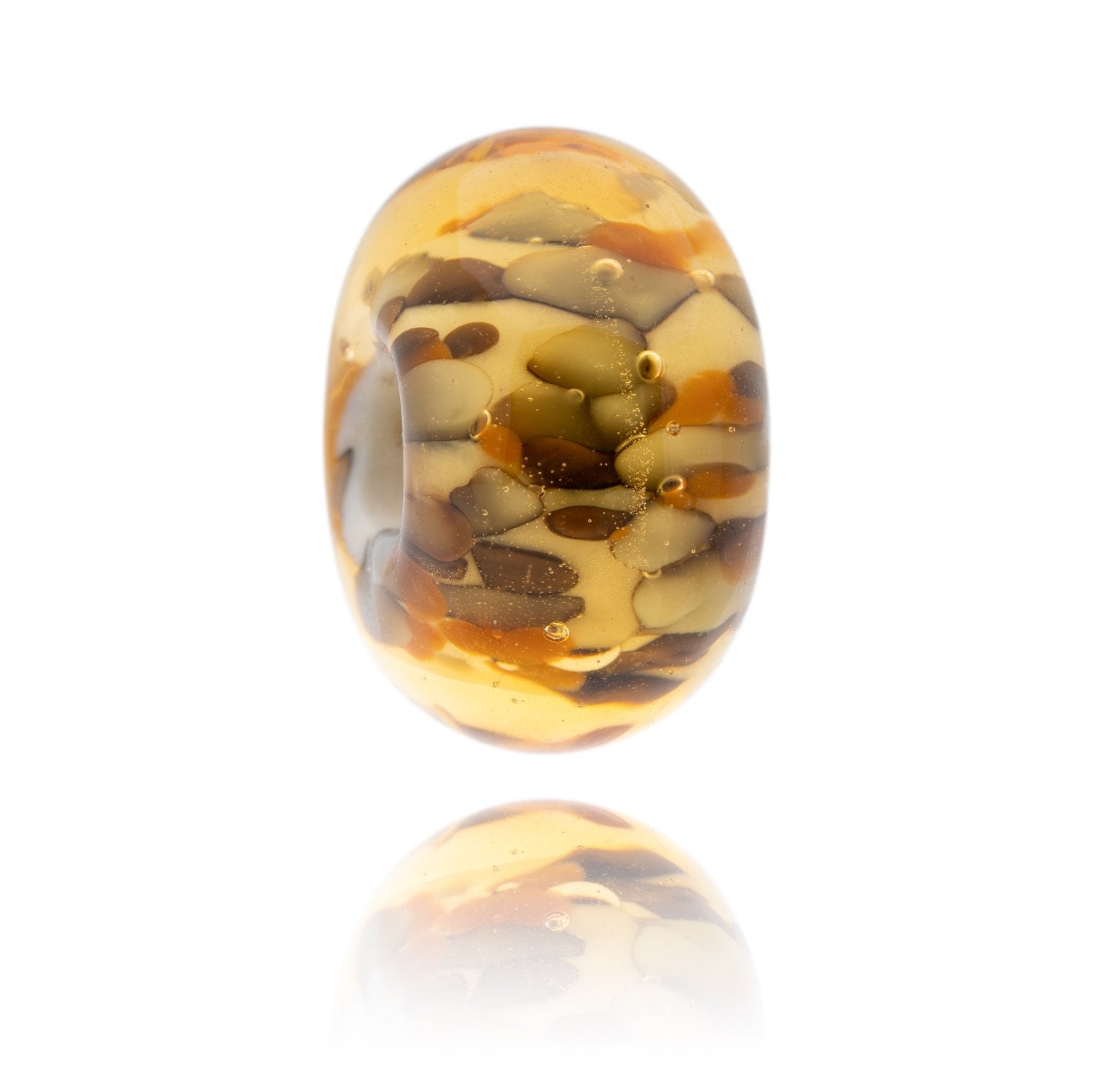 Amber, orange and brown glass bead representing Allonby beach in Cumbria.