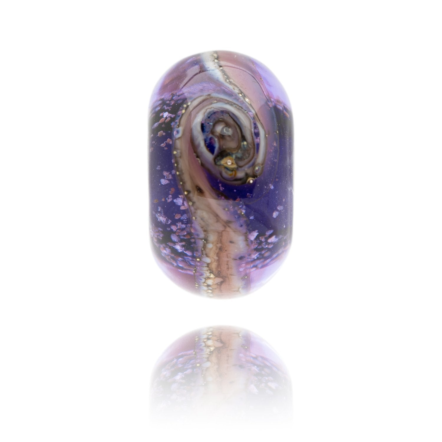 Purple swirling glass beads with sand inside, made to support the Ask For Jake charity in Braunton, North Devon.