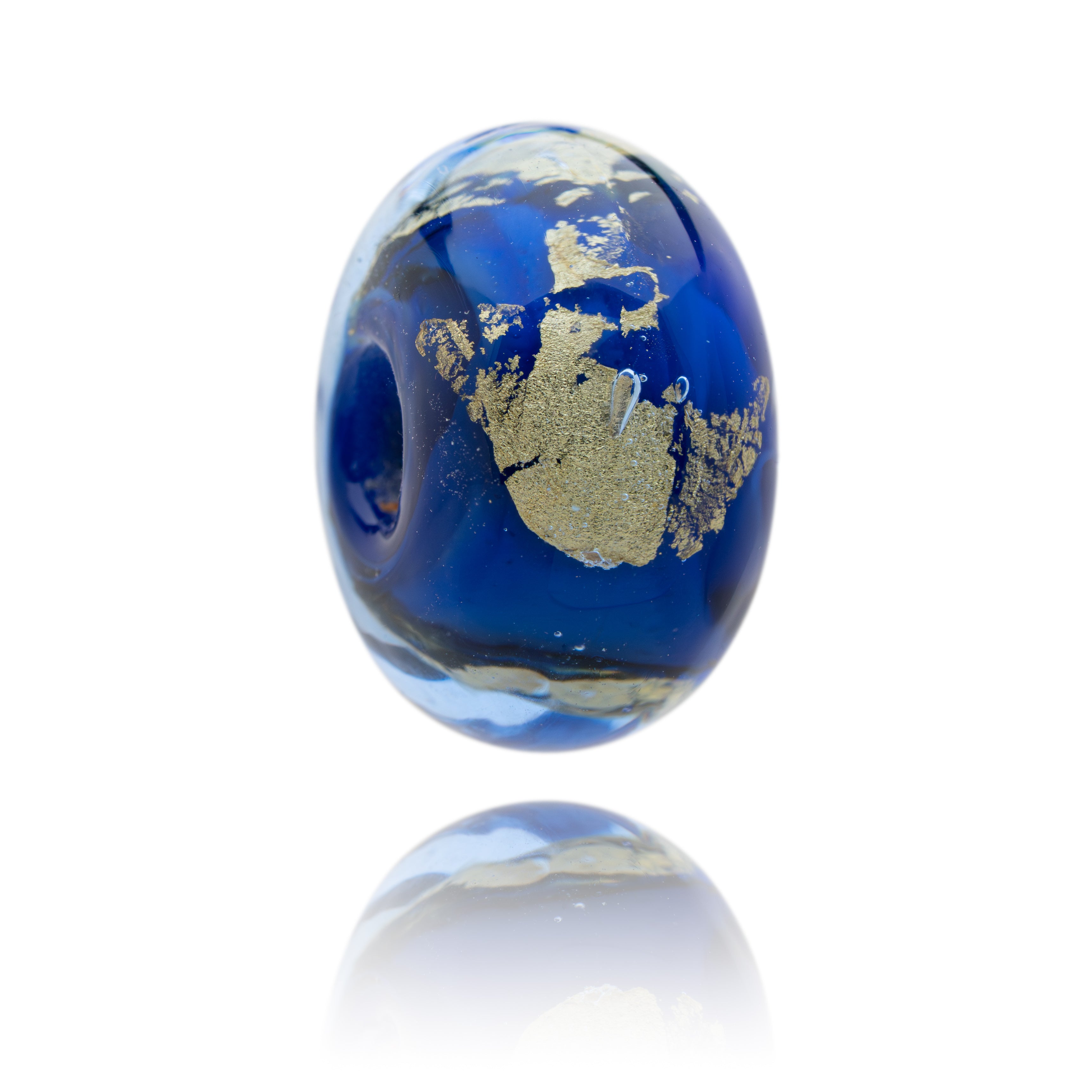 Blue glass bead with gold speckles on a white background