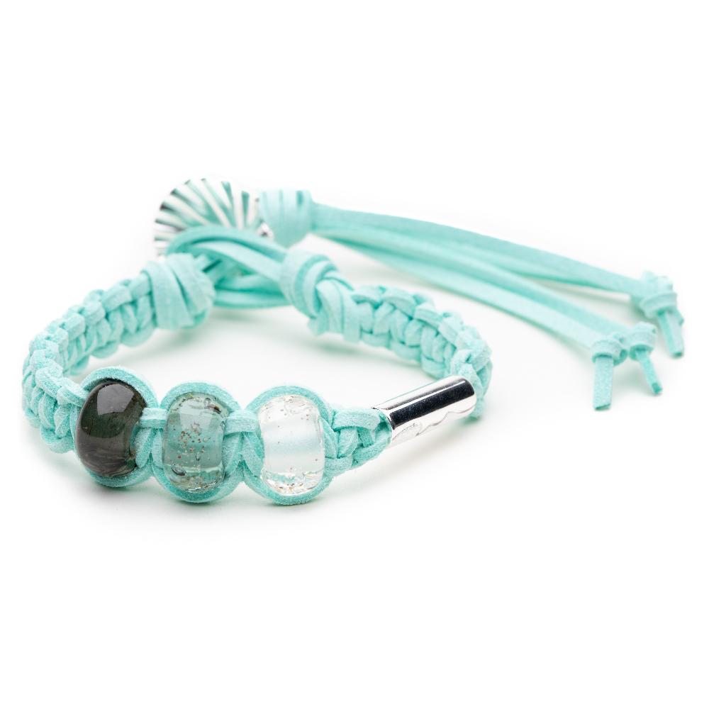 Mint cord macrame bracelet with glass beads and silver charm.