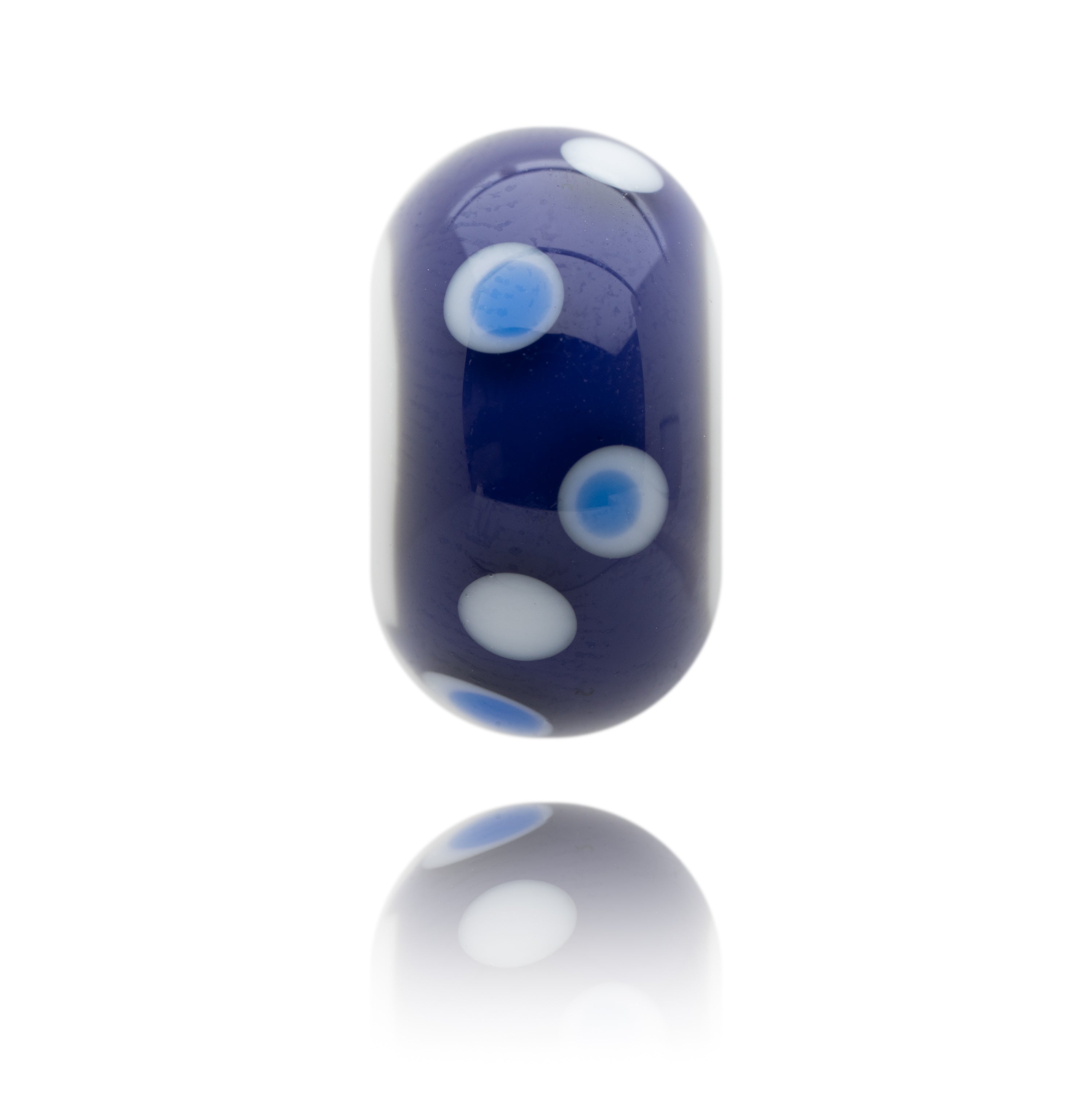 Purple and white glass beads with white and blue dots on surface, representing Calshot Hampshire.