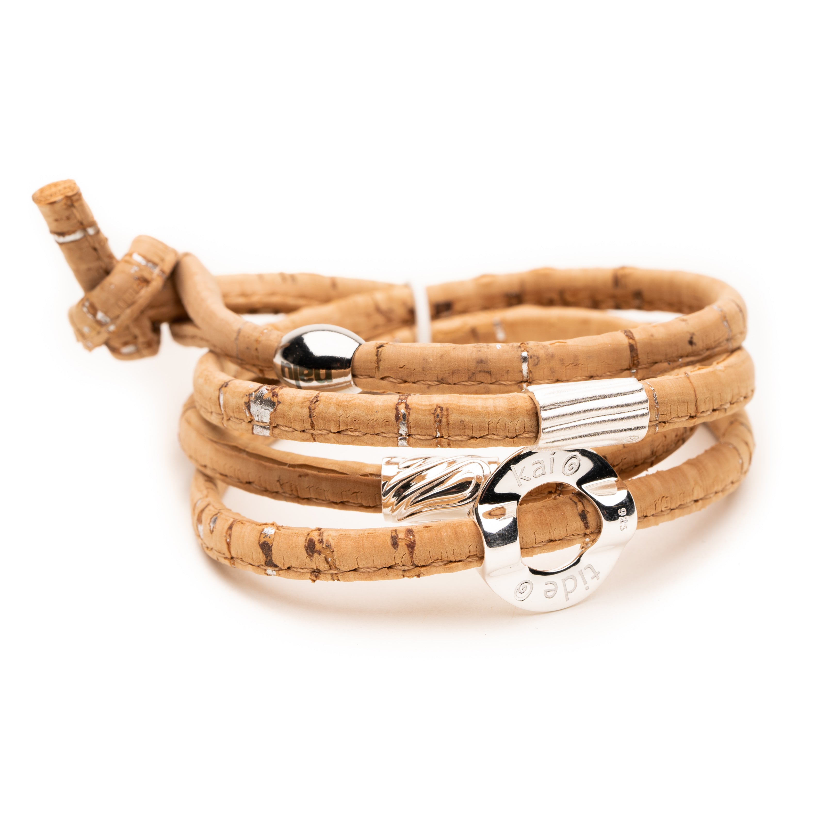 Natural cork wrap barrel;et with silver surf charms.