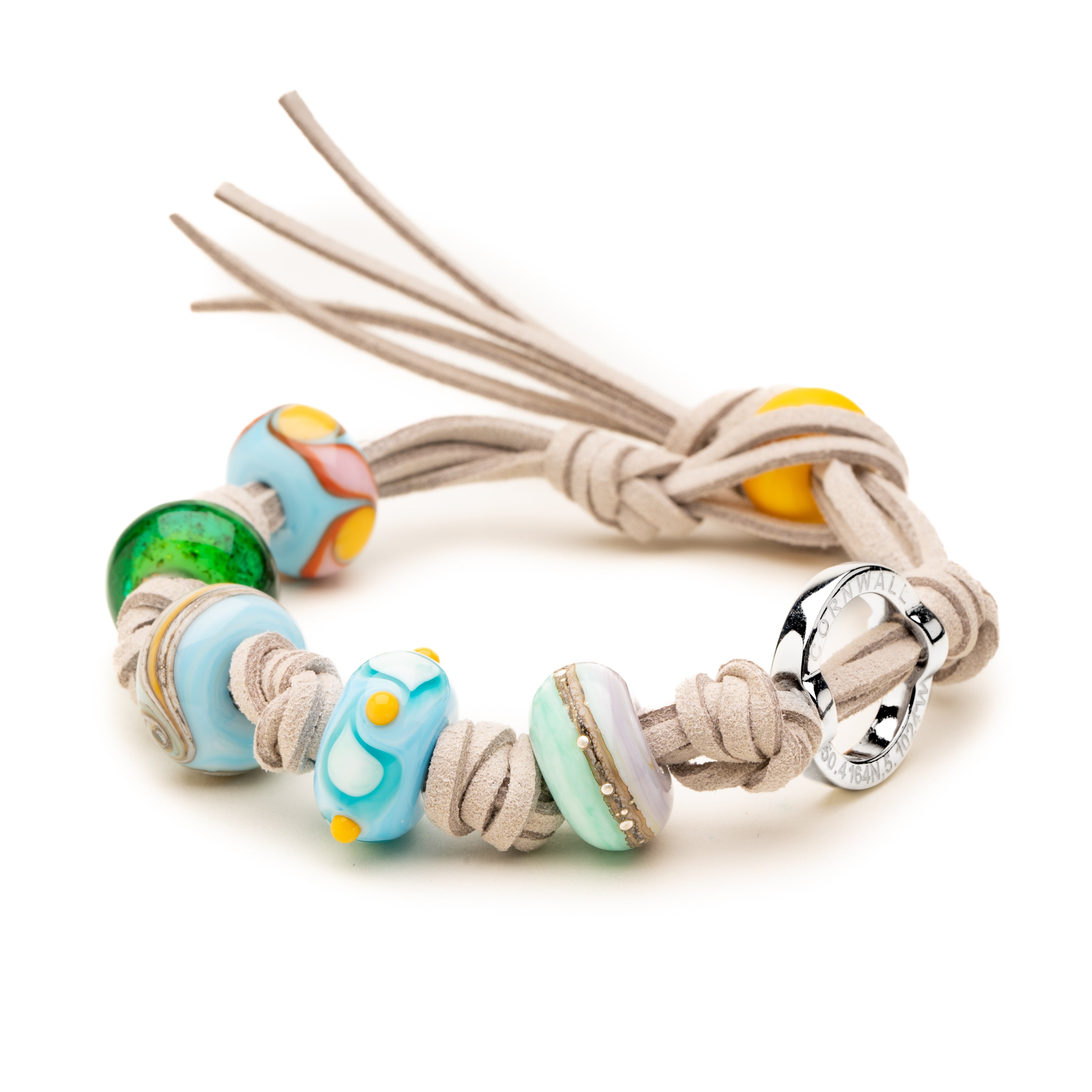 Pale sand cord bracelet with beach beads from Newquay beaches, handmade in UK.