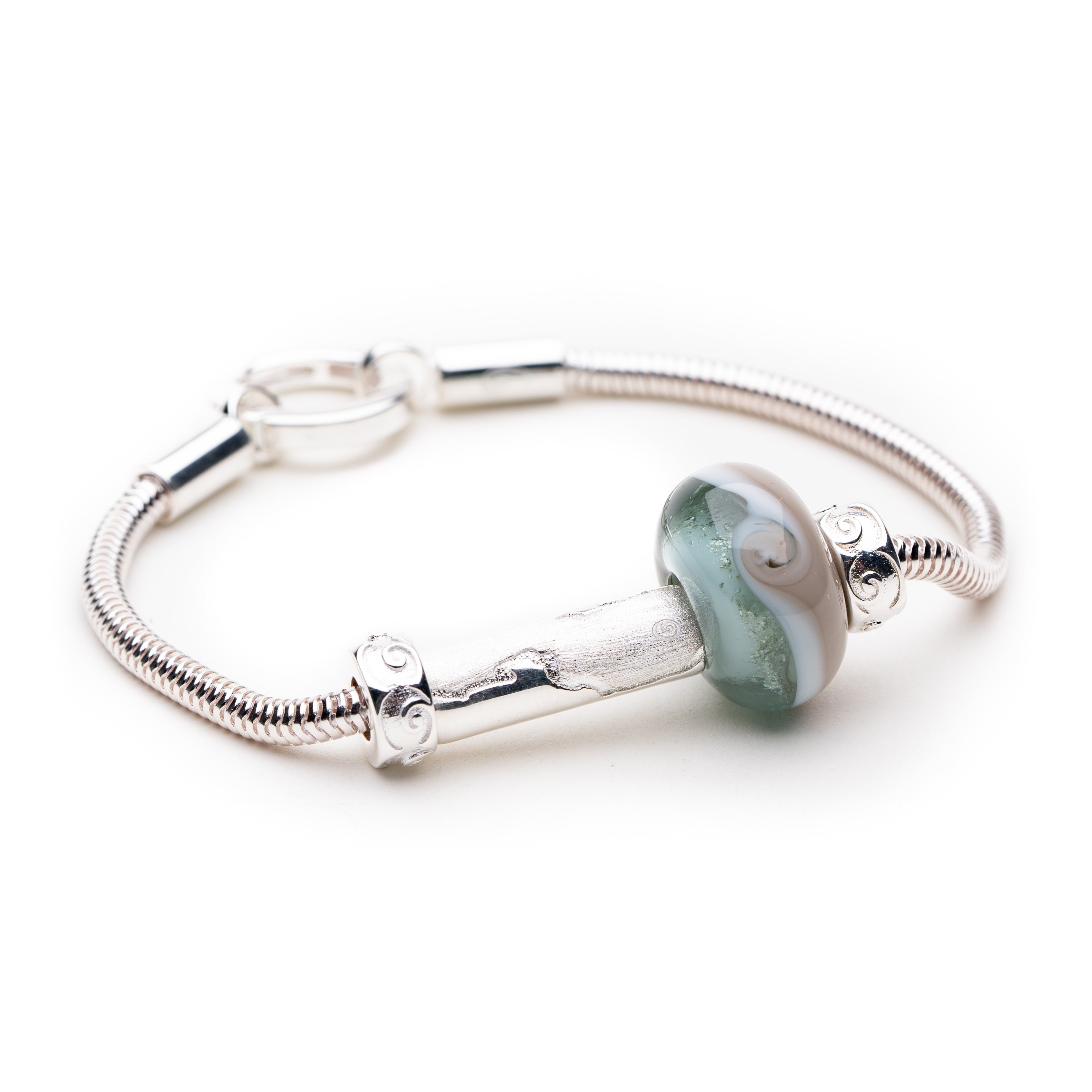 Silver bracelet with coastline and glass bead for Gower peninsula.