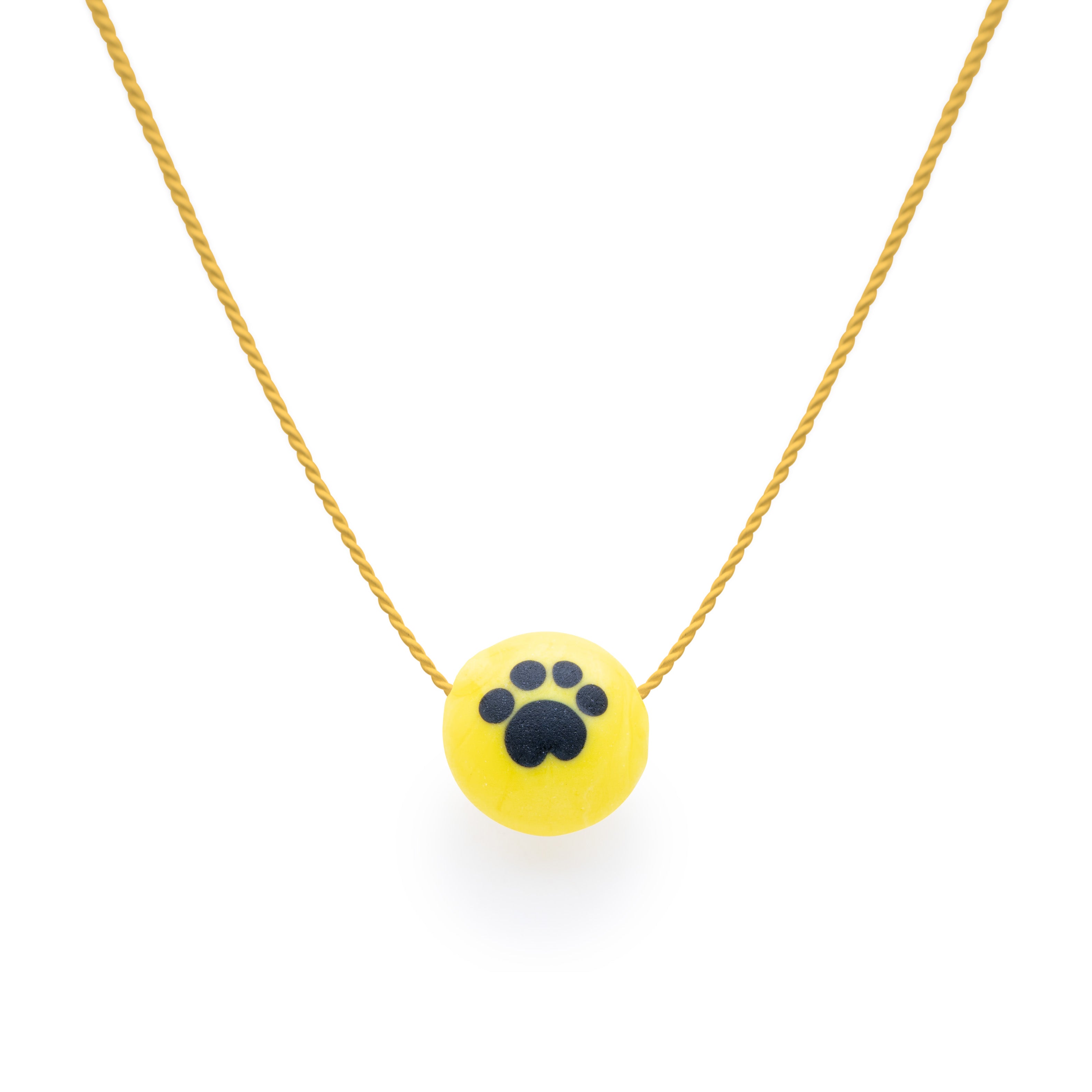 Yellow silk dogs trust charity pebble