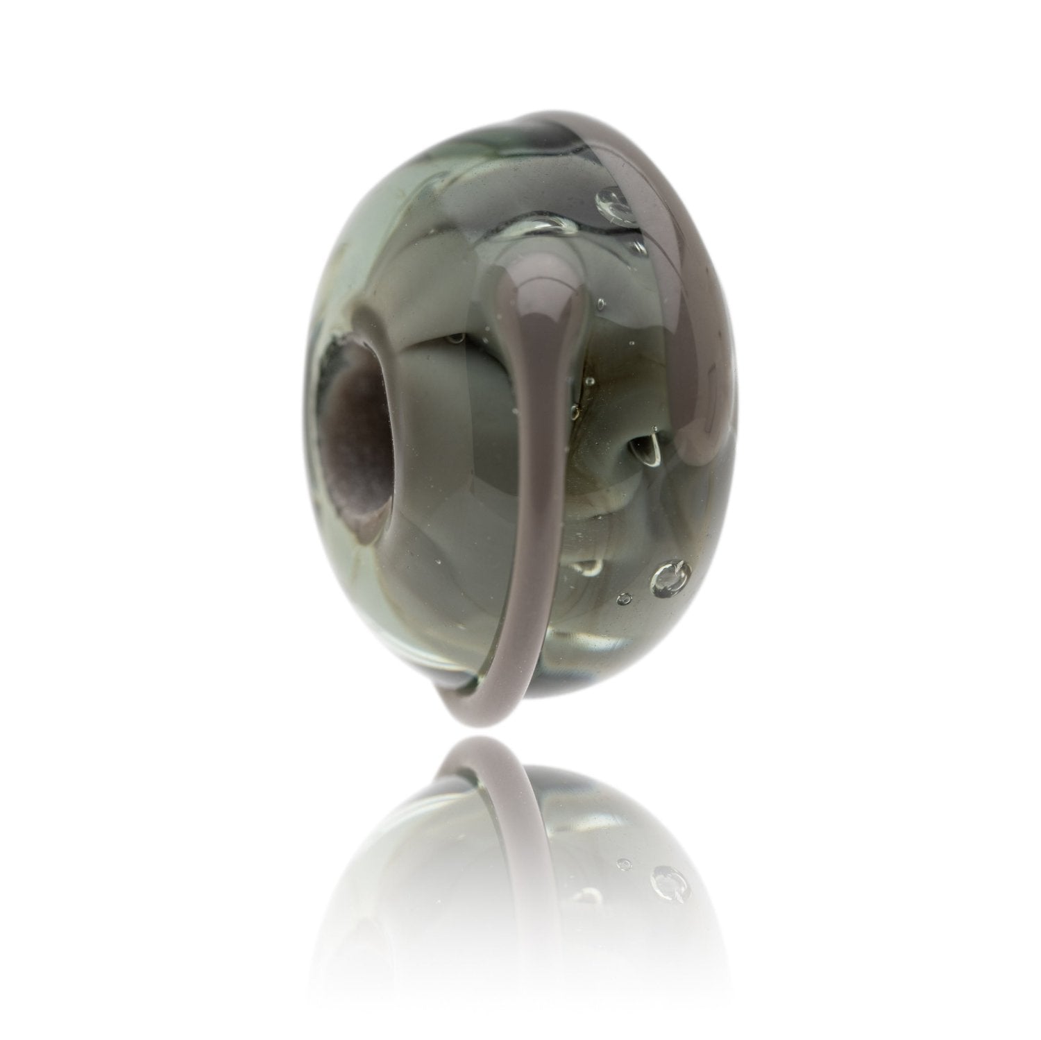 Grey glass bead representing a elephant being sold to raise funds for the World Wildlife Foundation.