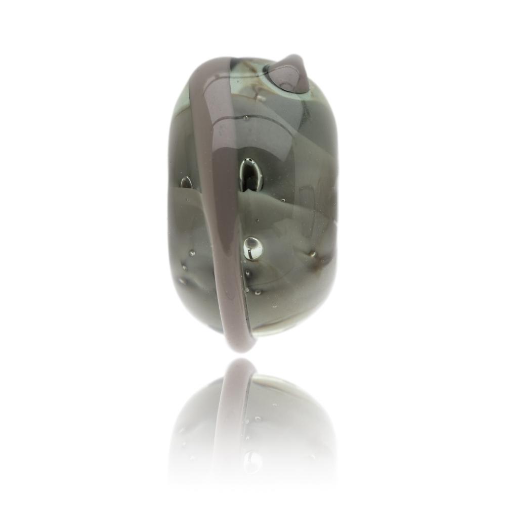 Grey glass bead representing a elephant being sold to raise funds for the World Wildlife Foundation.