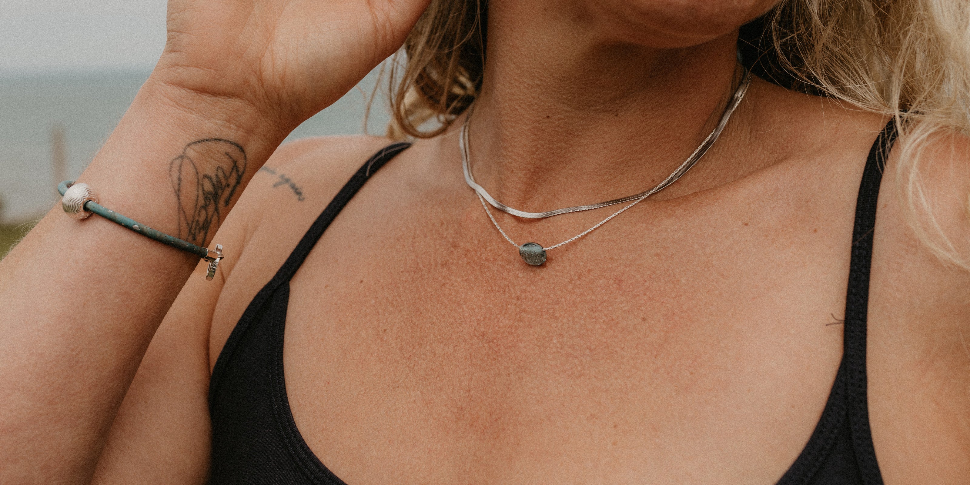 Silver necklace stack and cork bracelet gift collection.