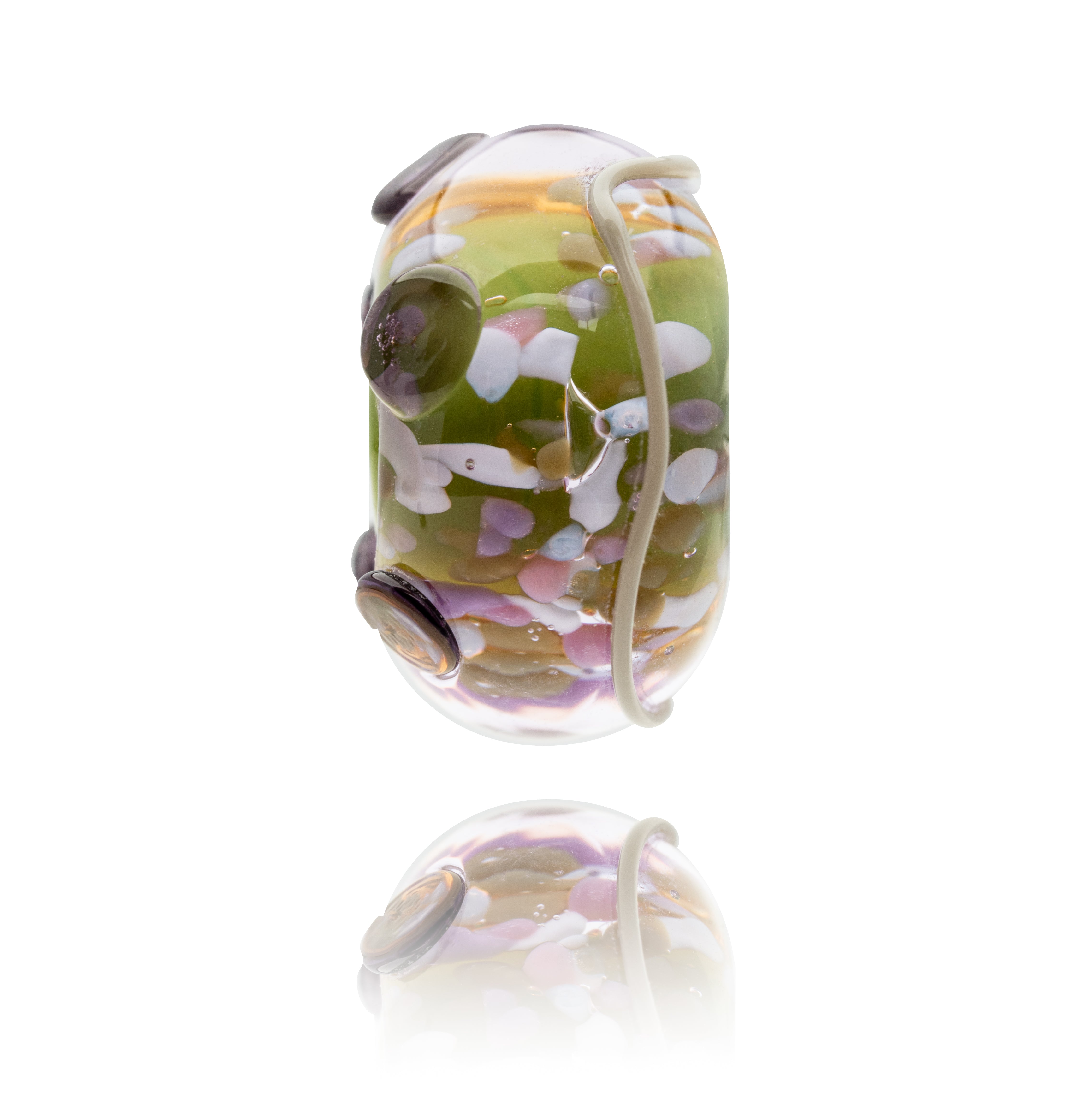 Decorative glass bead with multicolored pattern on a white background.